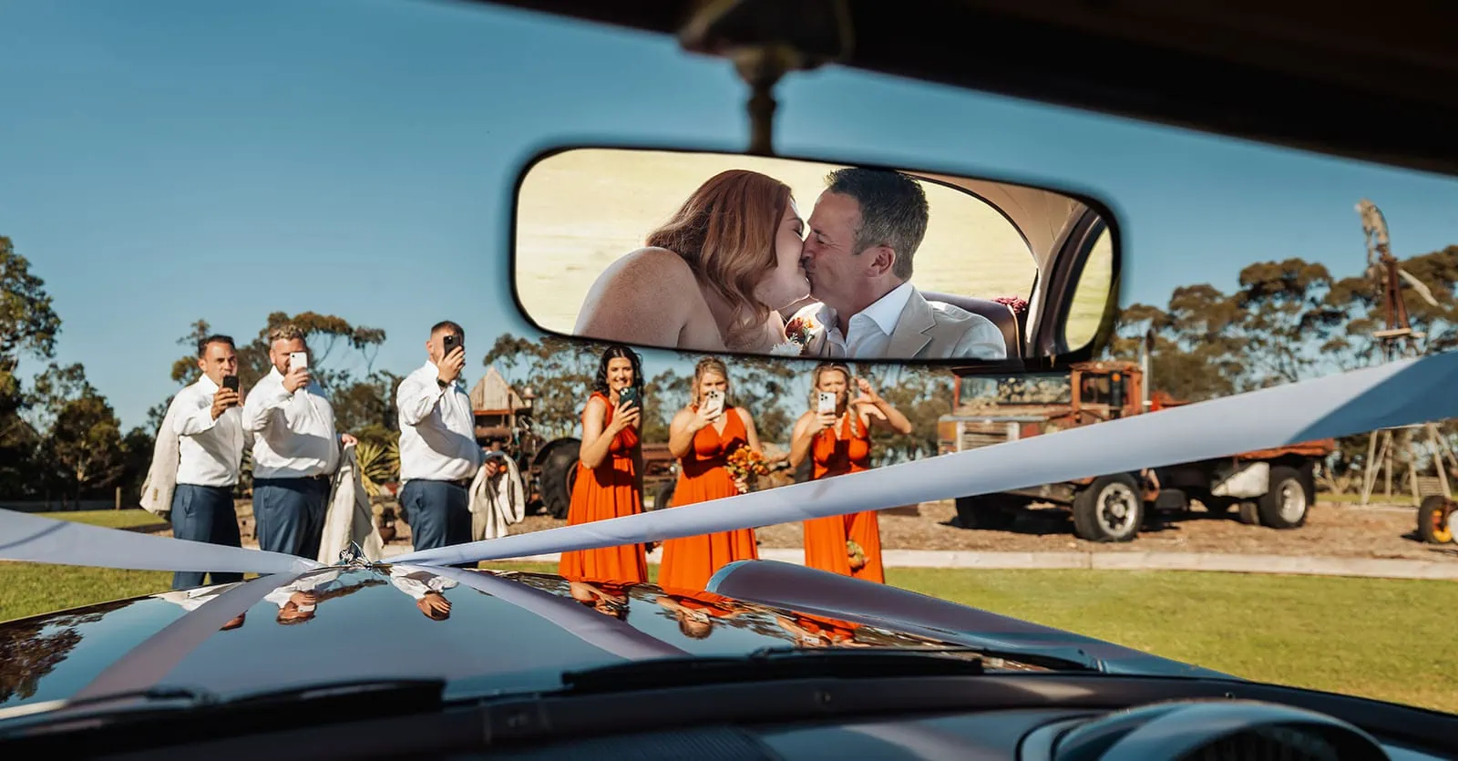 country victoria wedding in corrunnun – rachelle & anthony 348 Bride and groom reflection in car mirror on wedding day.