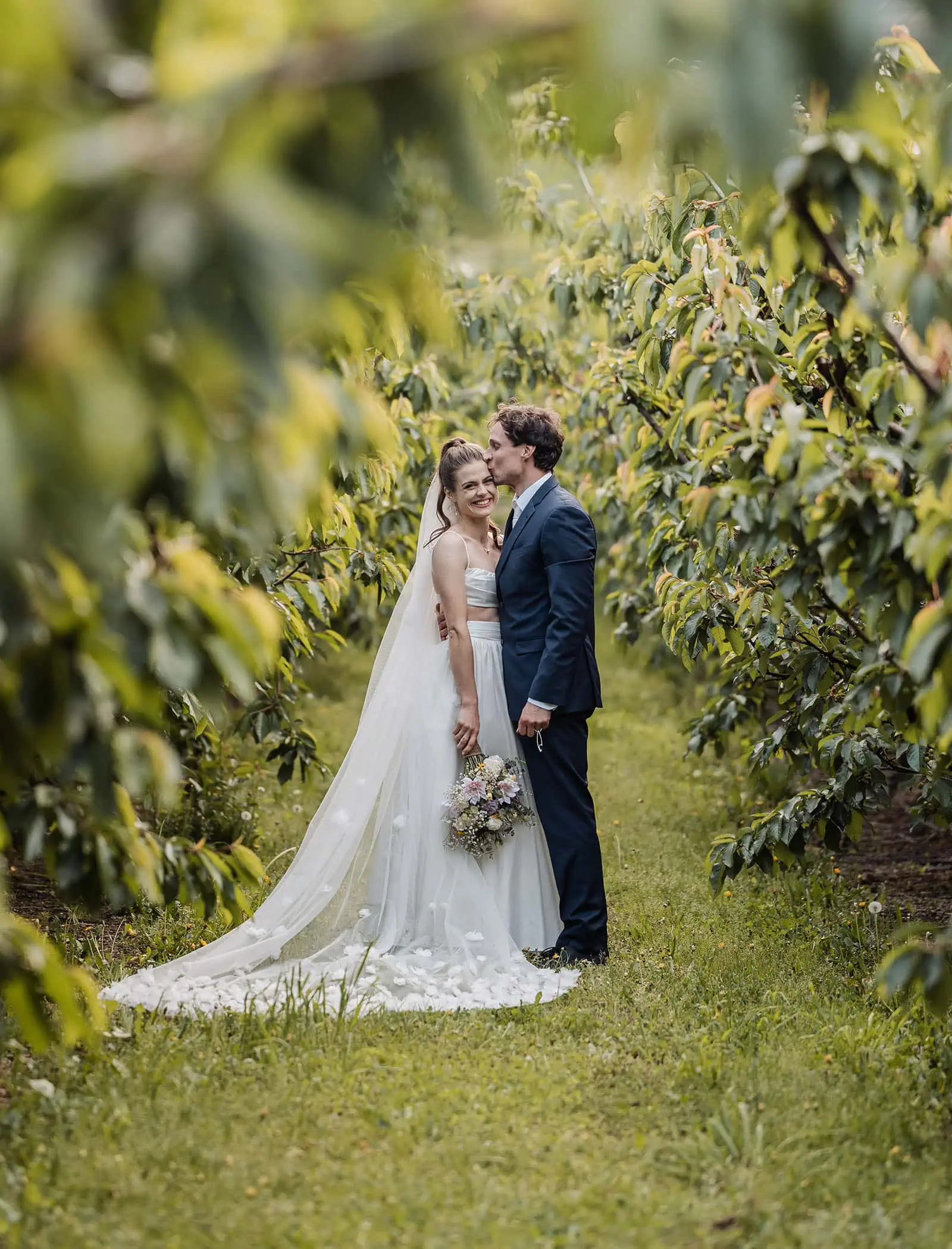 fleurieu cherries wedding - kimberley & richard 80 Elegant bride and groom embrace on their wedding day, celebrating love and romance.