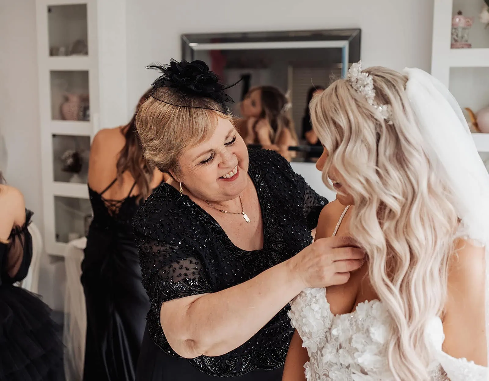silvestris of clarendon wedding - sam & wayne 201 Bride getting ready on her wedding day with elegant gown and accessories.