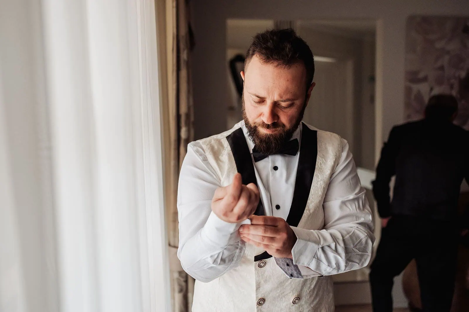 silvestris of clarendon wedding - sam & wayne 186 Groom Adjusts Cuffs Before Ceremony