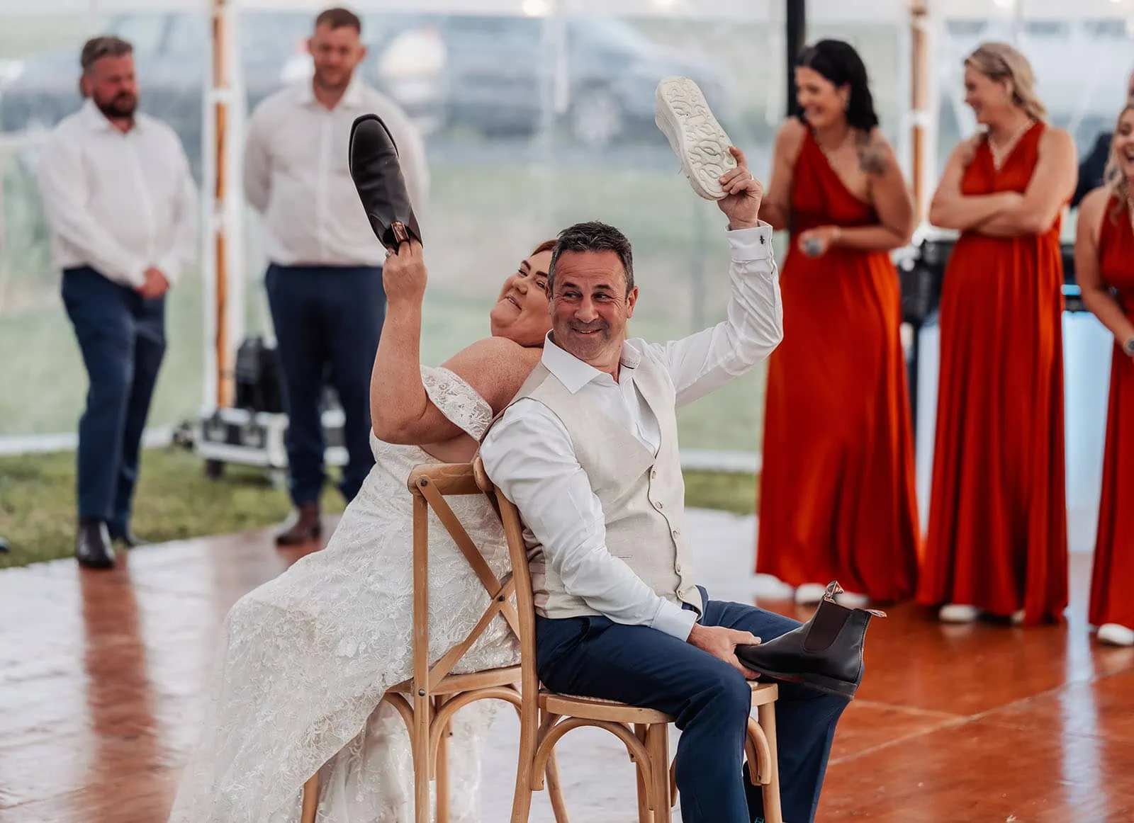 country victoria wedding in corrunnun – rachelle & anthony 365 Bride and groom playing the wedding shoe game at reception.