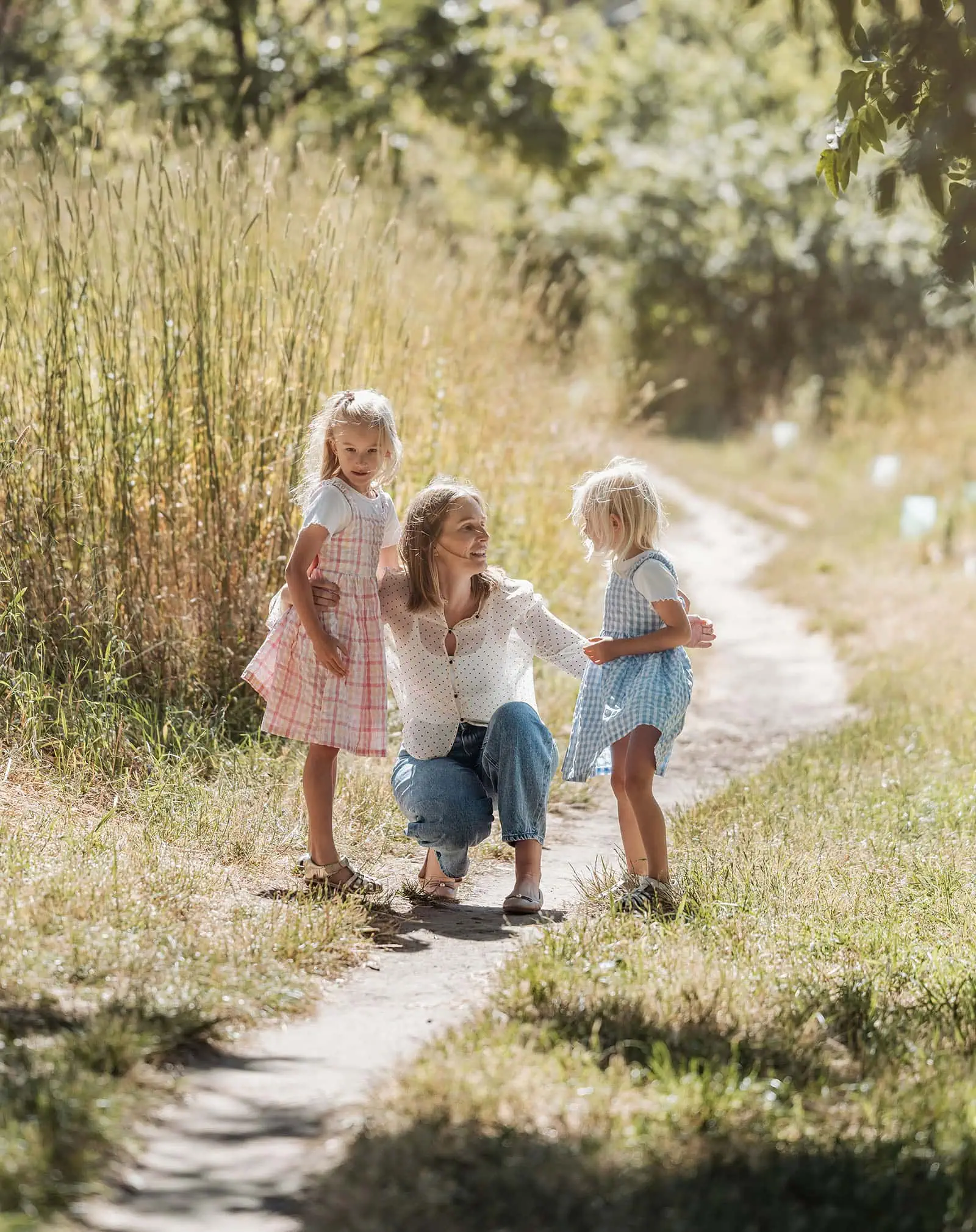 blackwood forest family photography 67 Mother and daughters enjoying a sunny day on a nature path.