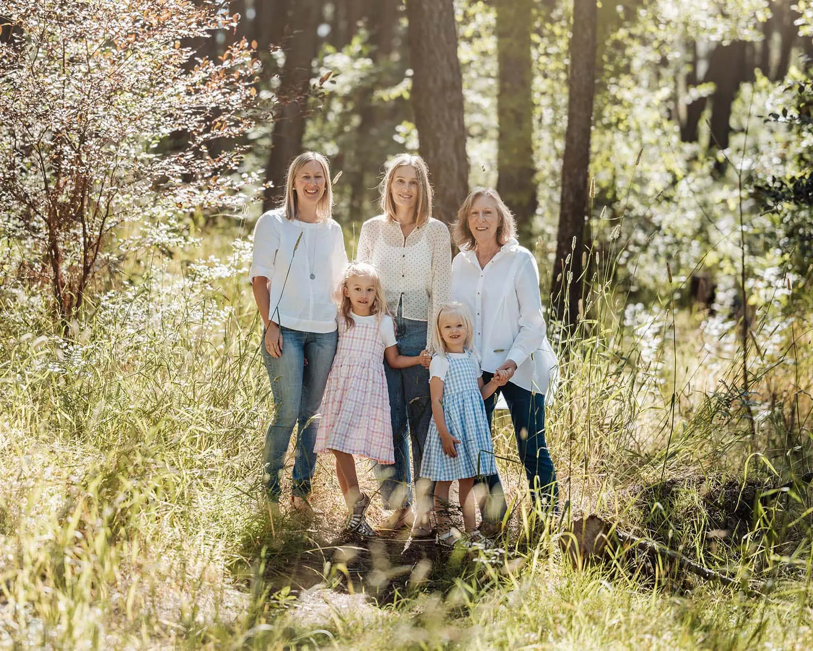 blackwood forest family photography 72 Family in forest, three generations, casual attire, exploring nature, unity and tranquility.