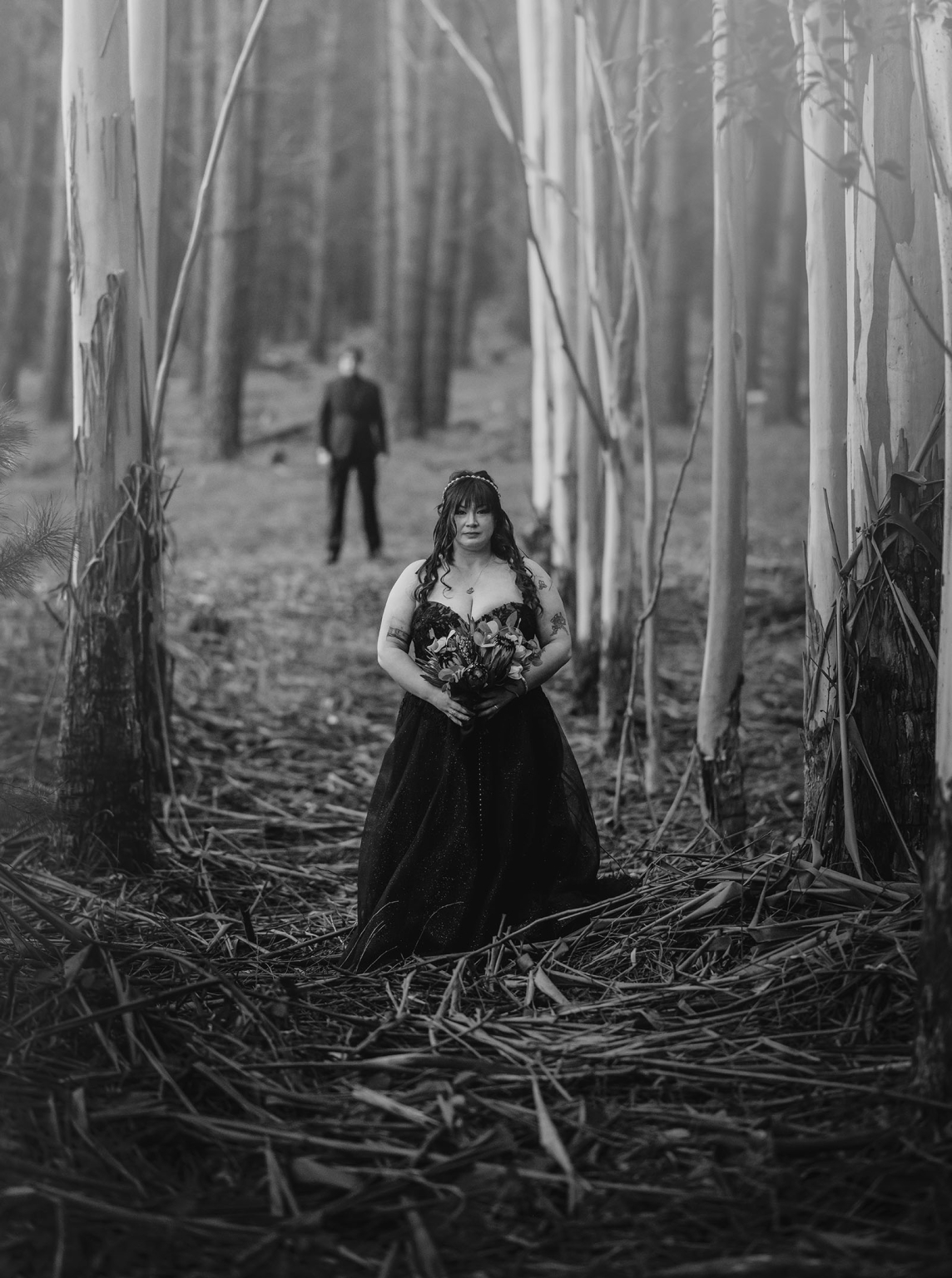 kuitpo forest metal themed wedding – erin & michael 21 Black and white forest wedding portrait of gothic bride and groom in eucalyptus grove.