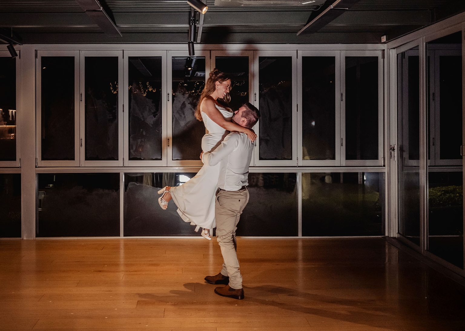 the lane vineyard wedding - caitlyn & craig 135 Romantic couple dancing, bride in white dress, intimate joyful moment at wedding event.