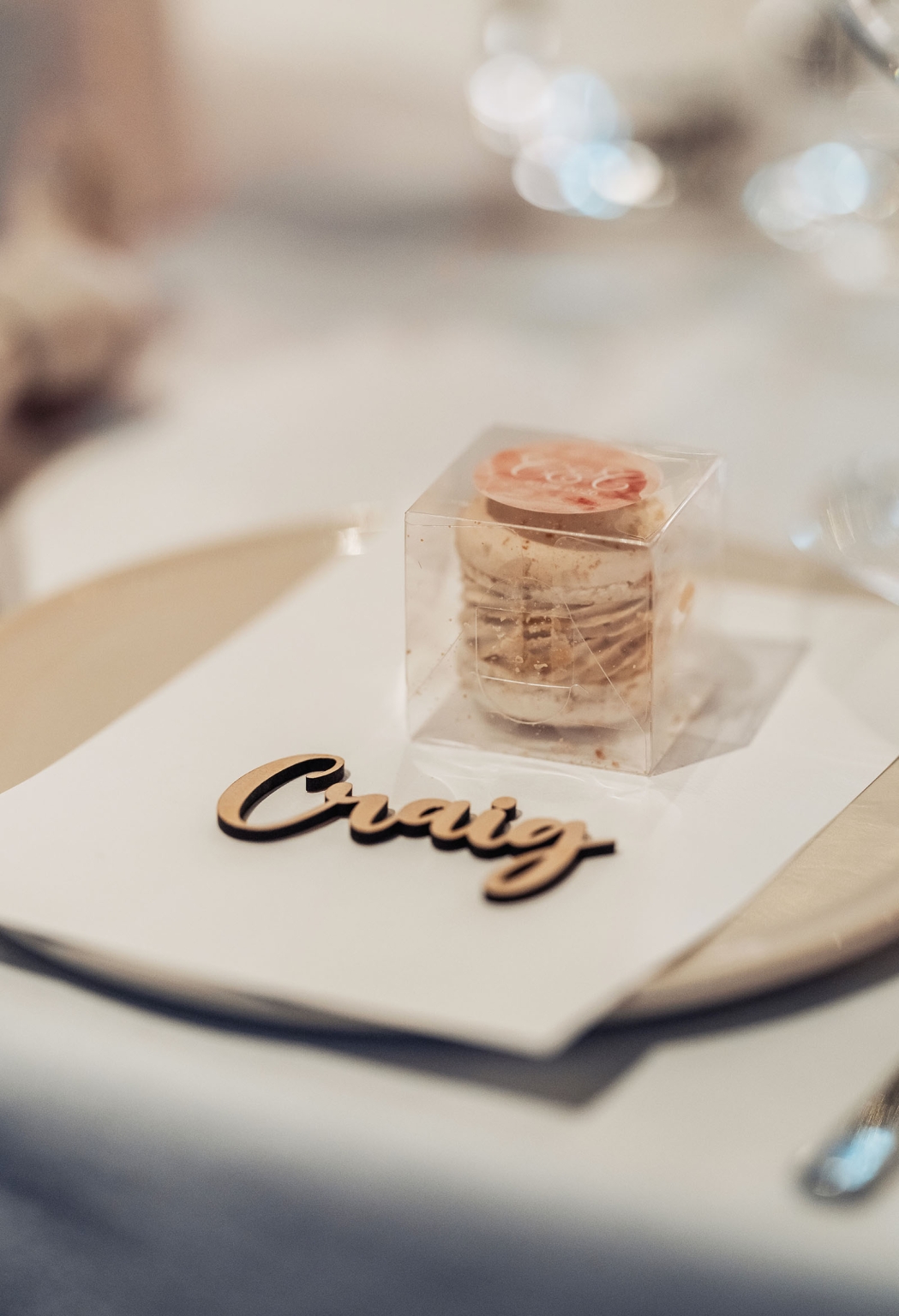 the lane vineyard wedding - caitlyn & craig 129 Elegant table setting with macaron favor and personalized wooden name card.