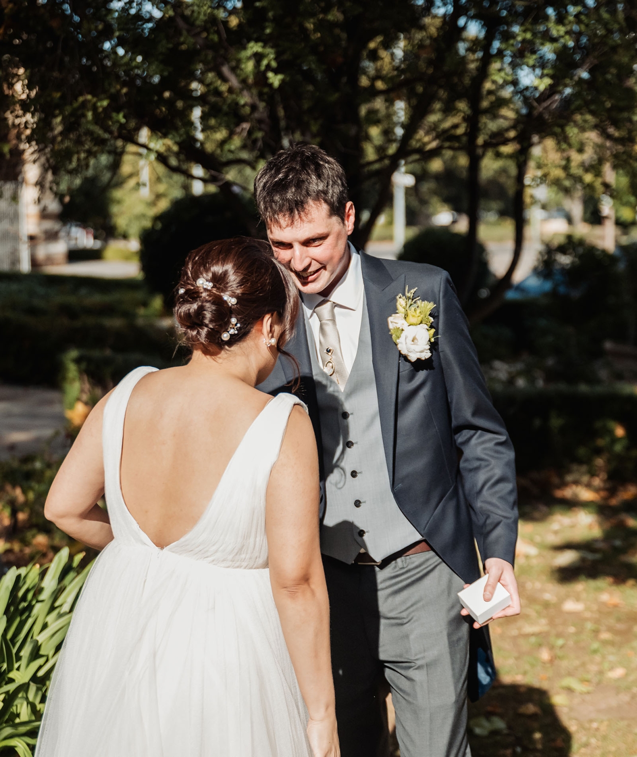 adelaide's st peter's cathedral wedding - irish & nick 7 Garden wedding bride and groom sharing a romantic moment outdoors.