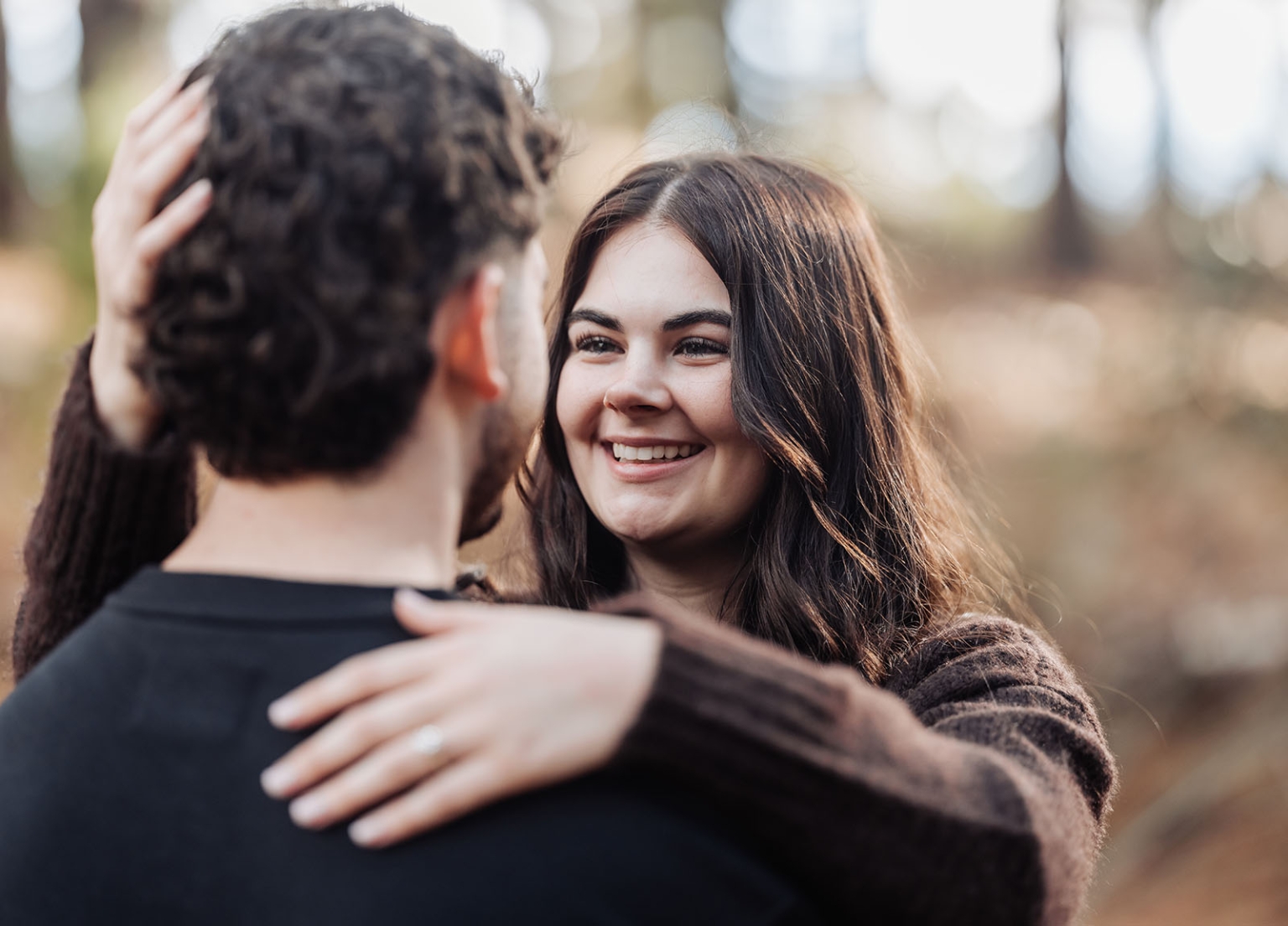 cabn at kuitpo forest proposal - tamsyn & blake 30 Romantic couple in warm embrace during golden hour in nature.