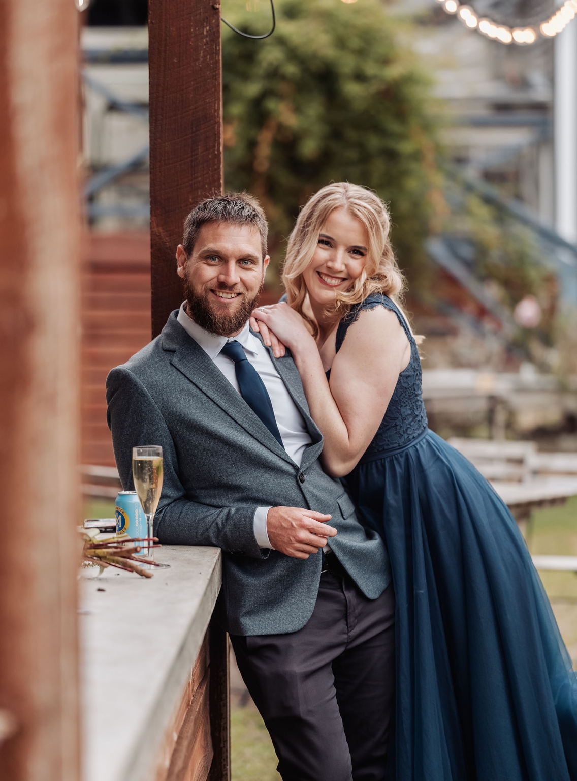 comida wedding - georgia & james 43 Elegant couple celebrating outdoors at formal event.