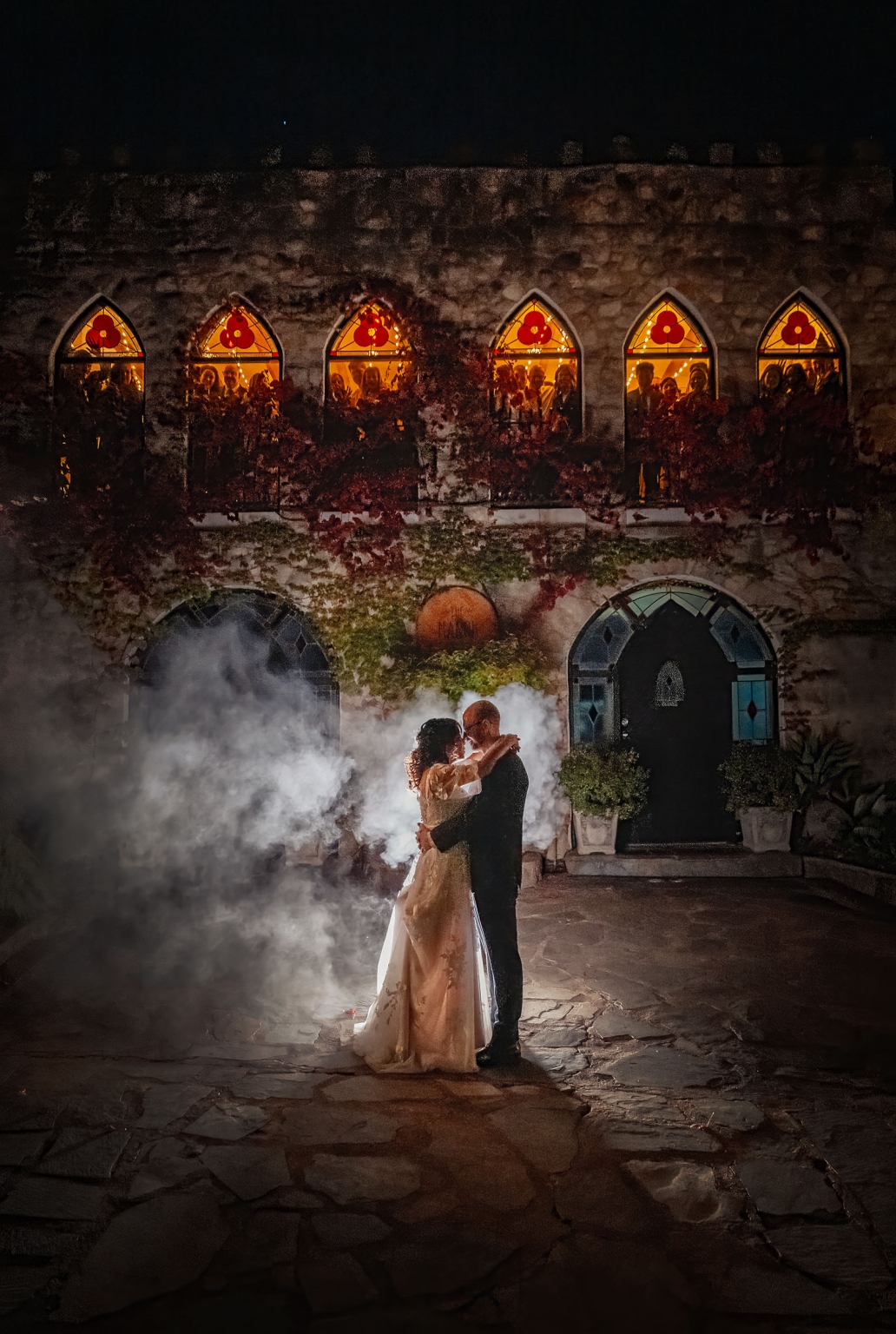 adelaide hills wedding at the manor - jo & dan 79 Night wedding couple dancing in fog outside rustic stone chapel.