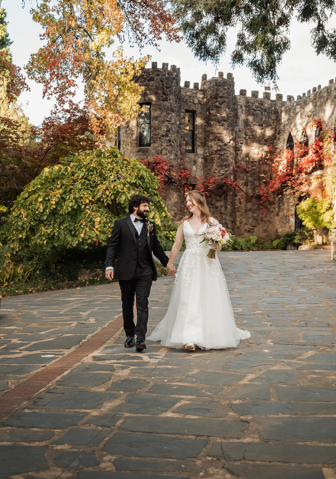 beautiful manor basket range wedding - sophie & theodore 122 Bride and groom in enchanting castle garden wedding scene with autumn foliage.