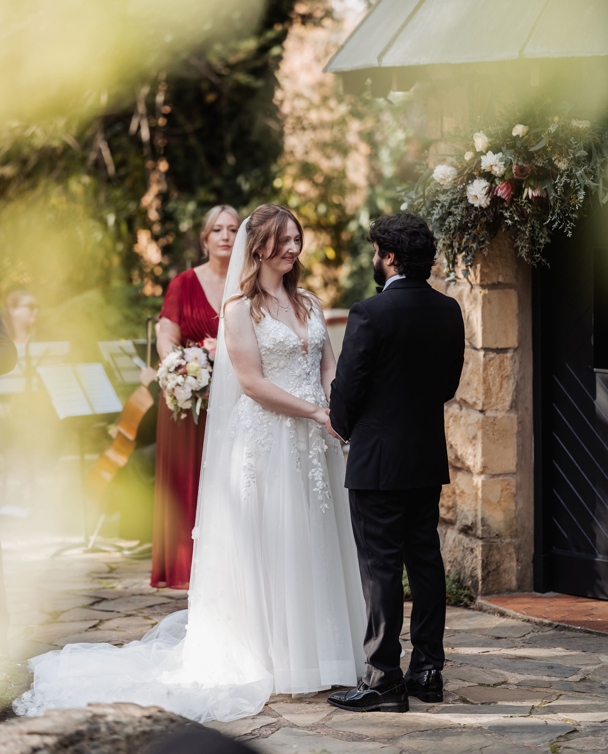 beautiful manor basket range wedding - sophie & theodore 101 Rustic outdoor wedding with bride in lace gown, groom, floral arch, and natural surroundings.