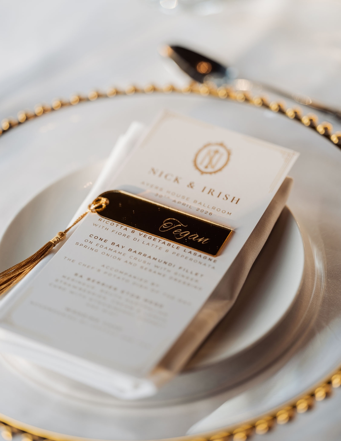 adelaide's st peter's cathedral wedding - irish & nick 51 Vegan wedding menu card on elegant gold charger place setting.