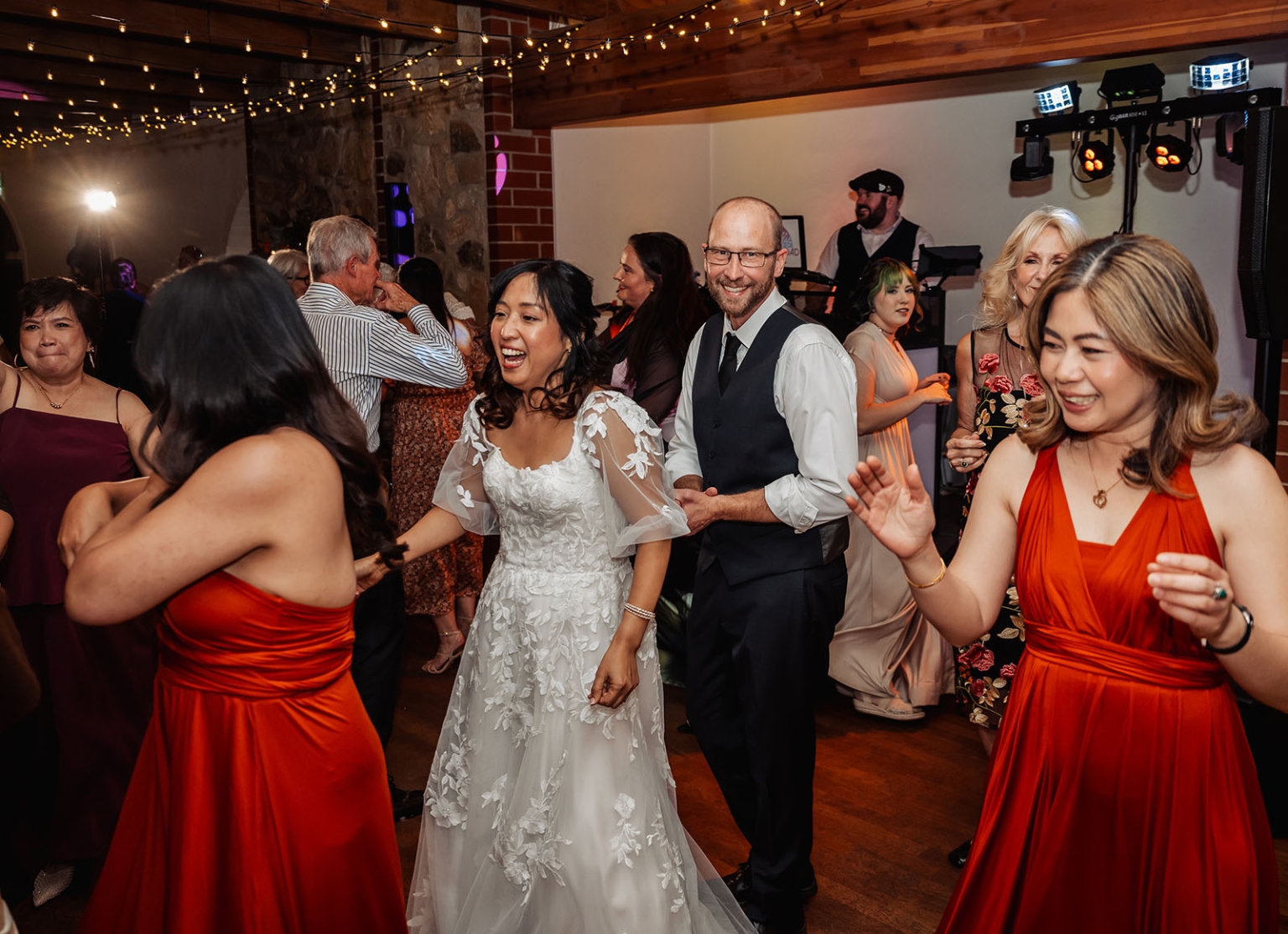 adelaide hills wedding at the manor - jo & dan 66 Bride and guests dancing on a lively wedding reception dance floor.