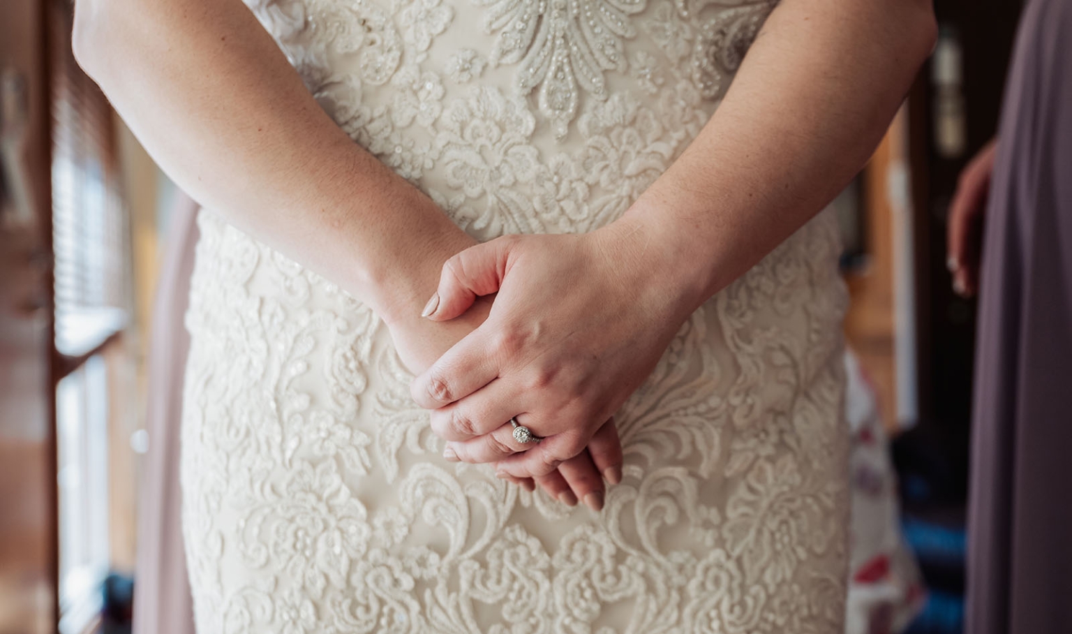 loxton's st peter's church wedding - madeline & brayden 23 Brides hands with wedding ring on lace bridal gown.