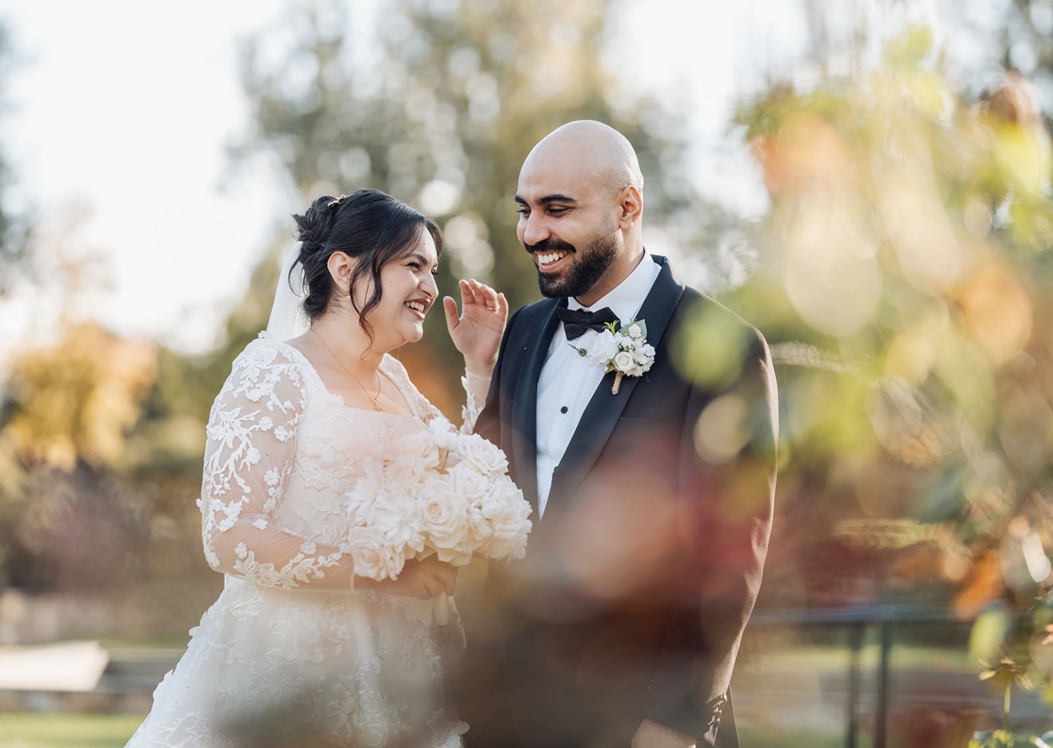 st george & st shenouda coptic church wedding - carmina & bill 55 Bride and groom smiling at a romantic outdoor garden wedding.