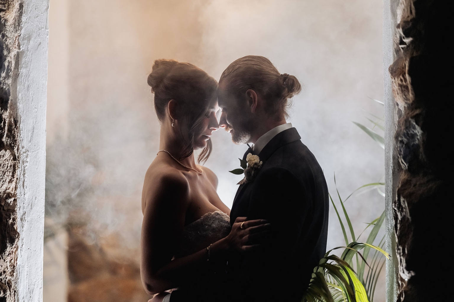 the manor wedding - crystal & mackenzie 99 Romantic bride and groom portrait in glowing rustic wedding alcove.