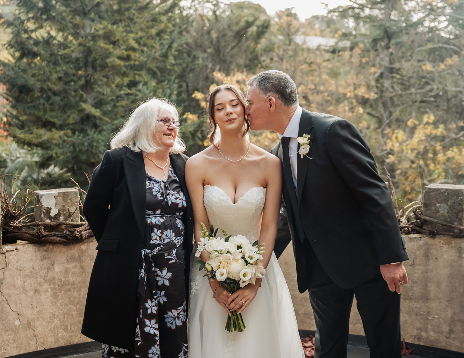 the manor wedding - crystal & mackenzie 32 Bride with parents in romantic garden wedding portrait.