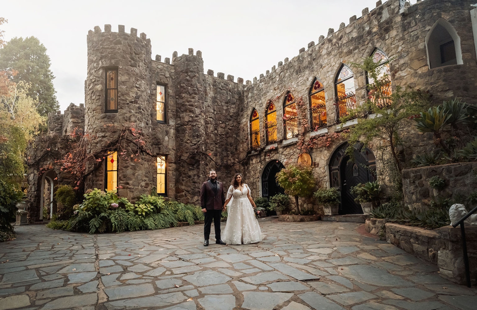 basket range wedding at the manor - leah & wes 62 Bride and groom wedding portrait in romantic castle courtyard.