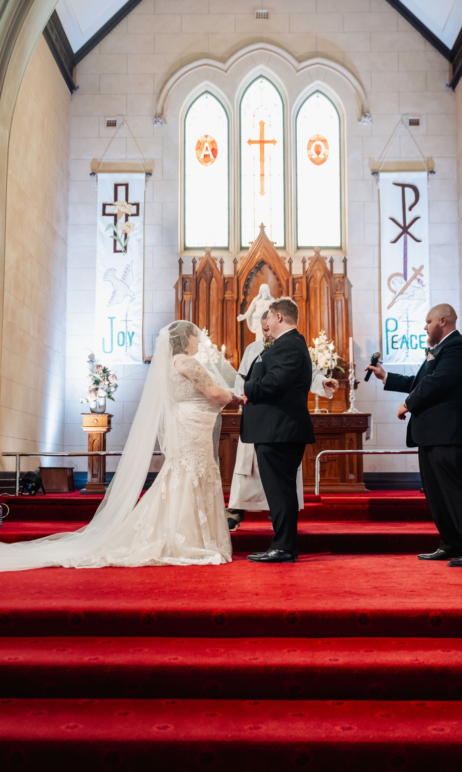 loxton's st peter's church wedding - madeline & brayden 37 Christian church wedding ceremony with bride and groom at altar.