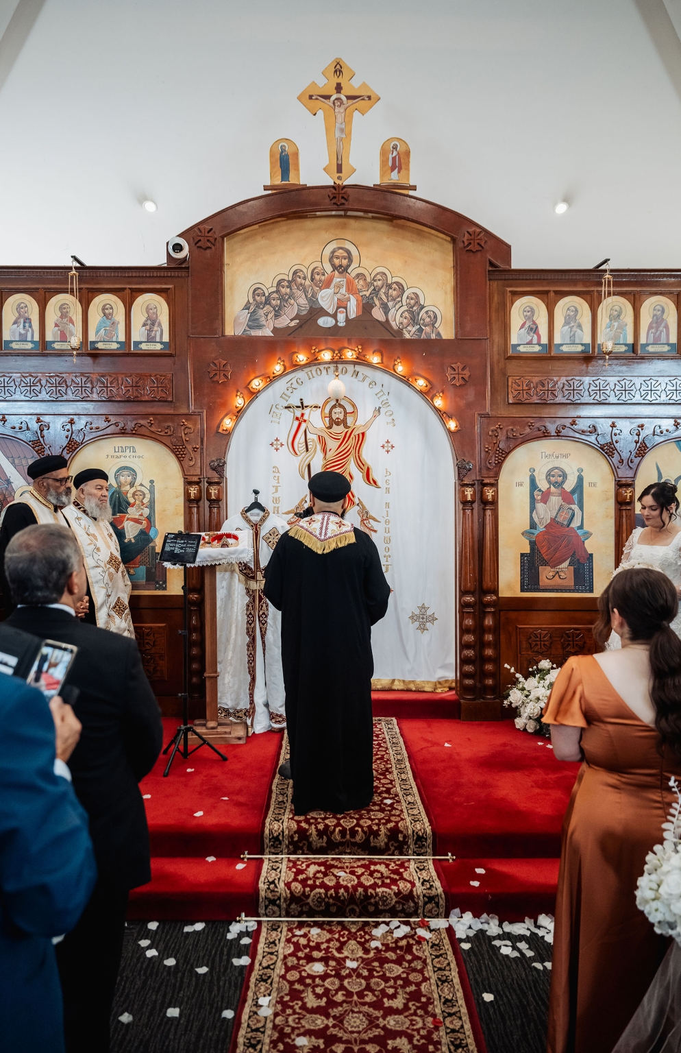 st george & st shenouda coptic church wedding - carmina & bill 39 Coptic church wedding ceremony before ornate iconostasis and altar.
