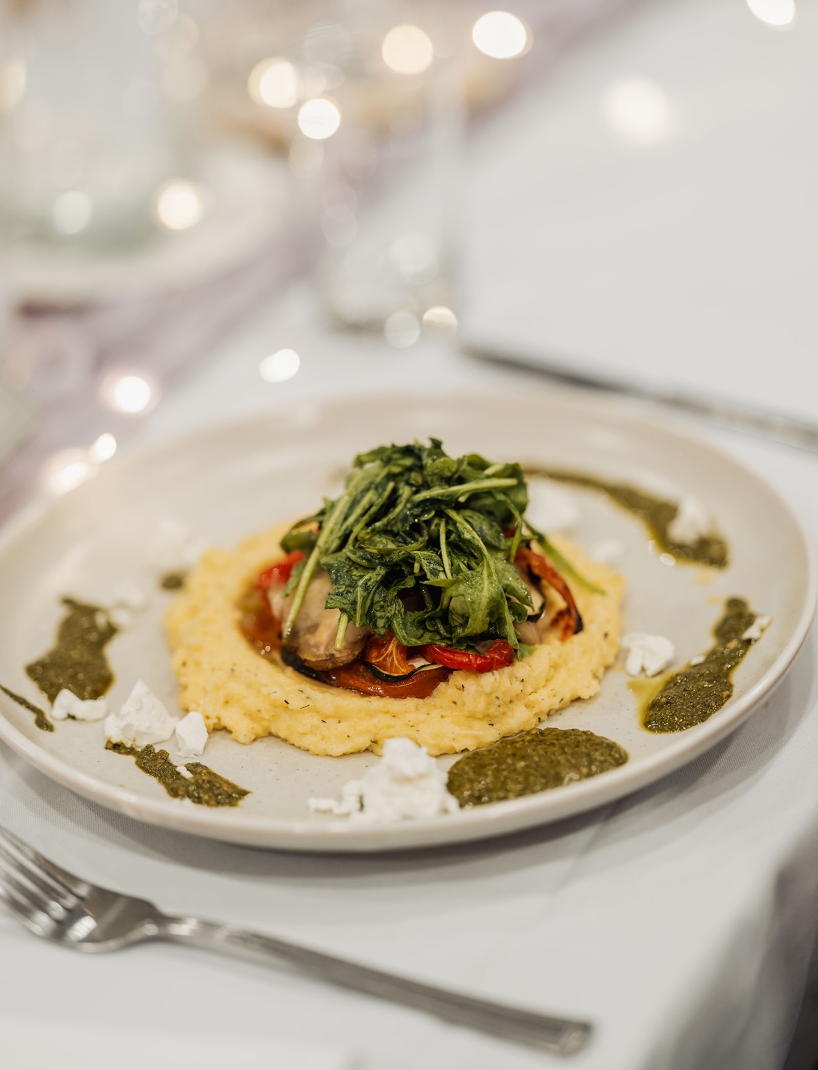 loxton's st peter's church wedding - madeline & brayden 59 Creamy polenta with roasted vegetables, arugula, pesto, and cheese.