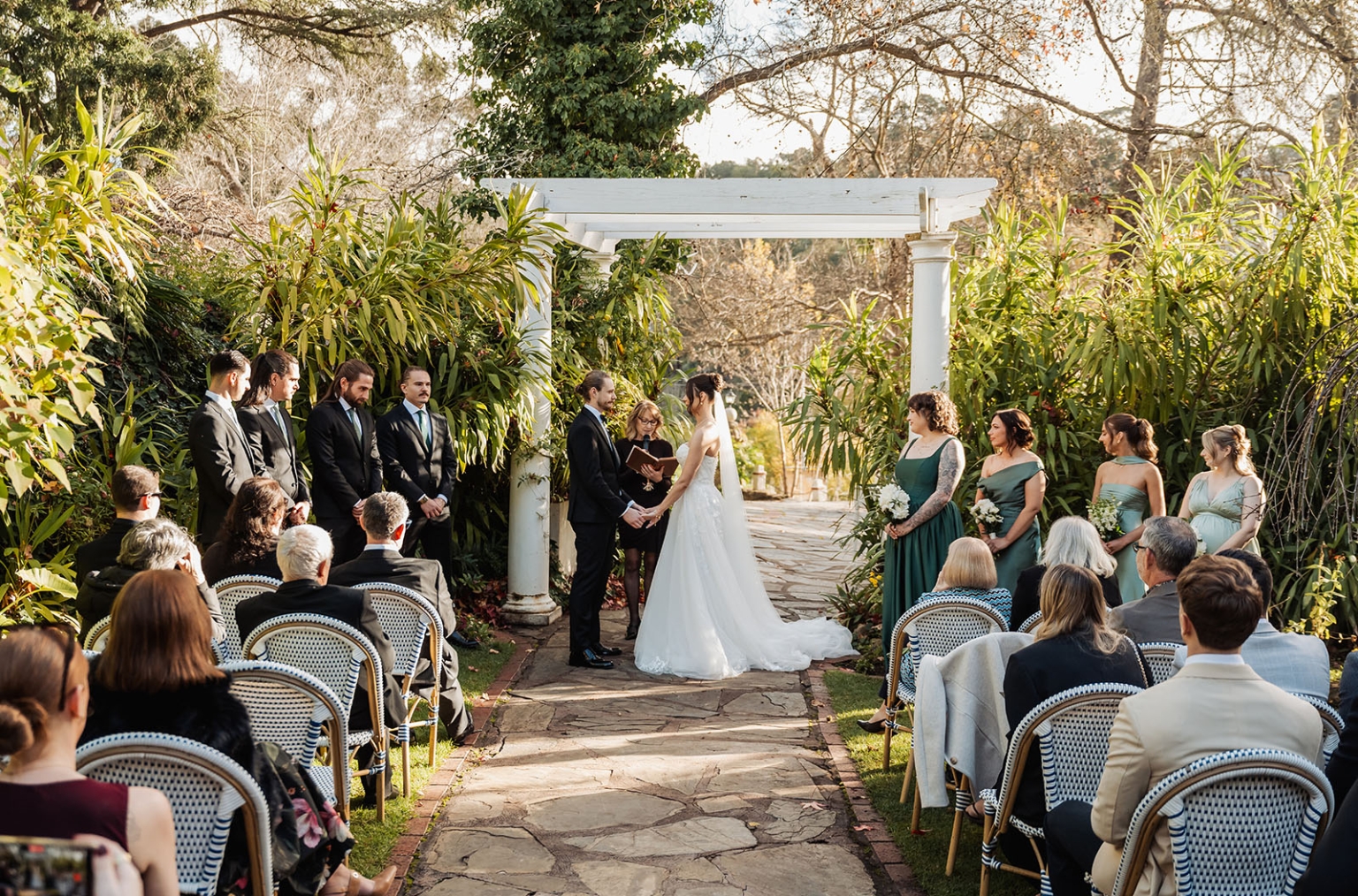 the manor wedding - crystal & mackenzie 52 Romantic garden wedding ceremony with bride, groom, bridal party, and guests.
