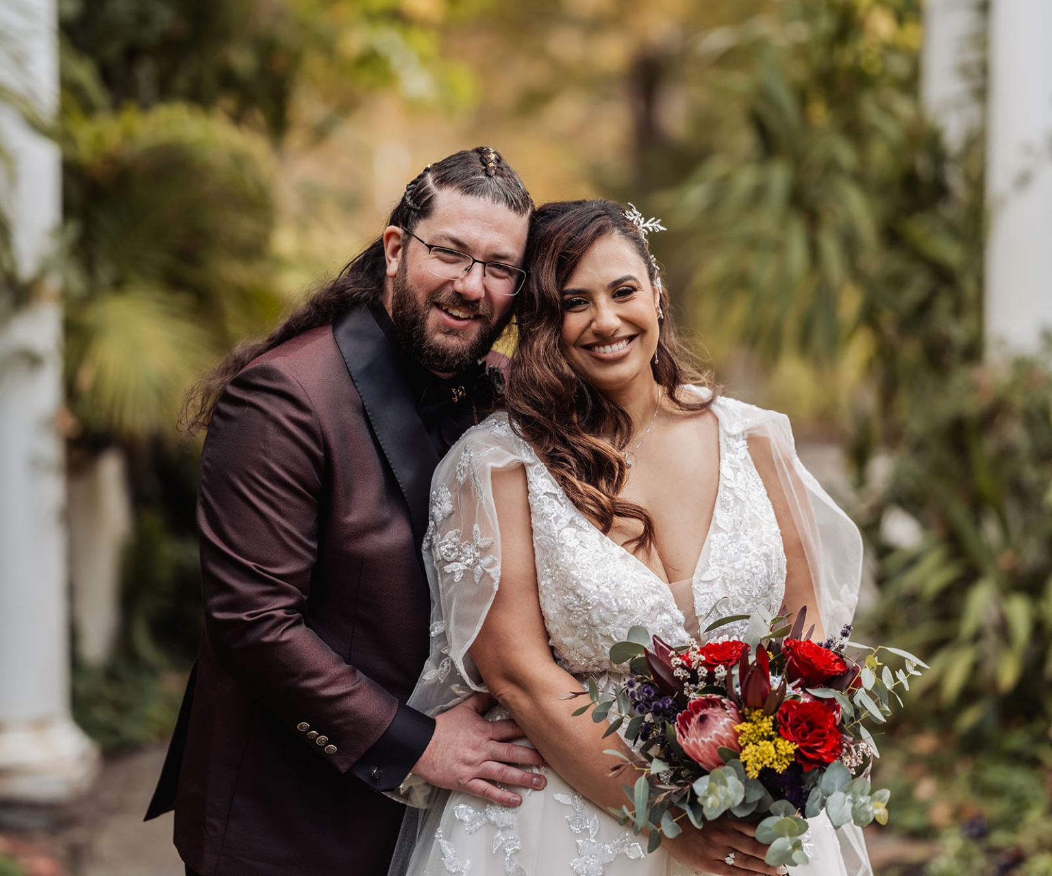 basket range wedding at the manor - leah & wes 33 Joyful bride and groom wedding portrait in romantic garden with colorful bouquet.