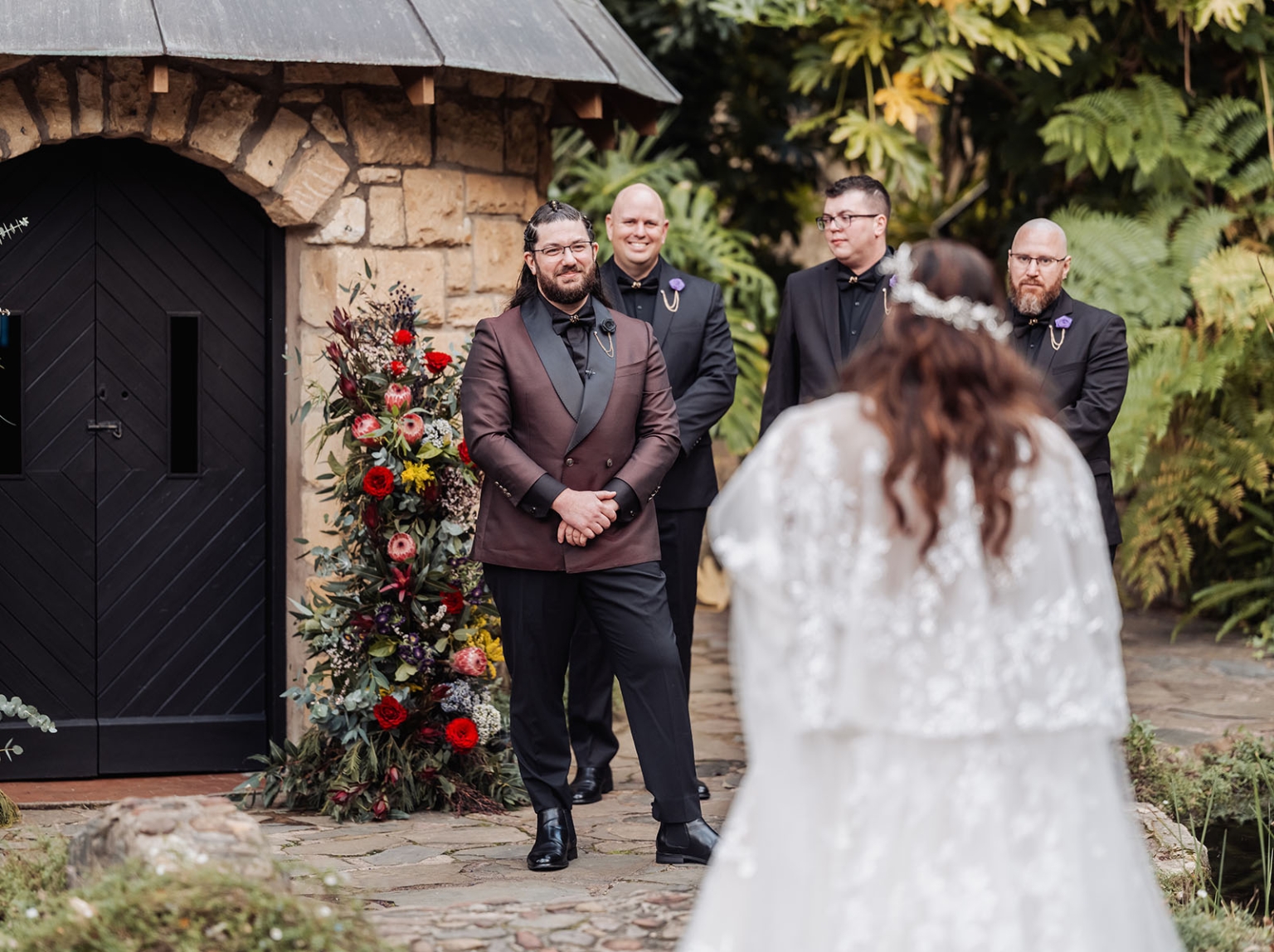 basket range wedding at the manor - leah & wes 44 Garden wedding first look with groom, groomsmen, and bride in lace gown.