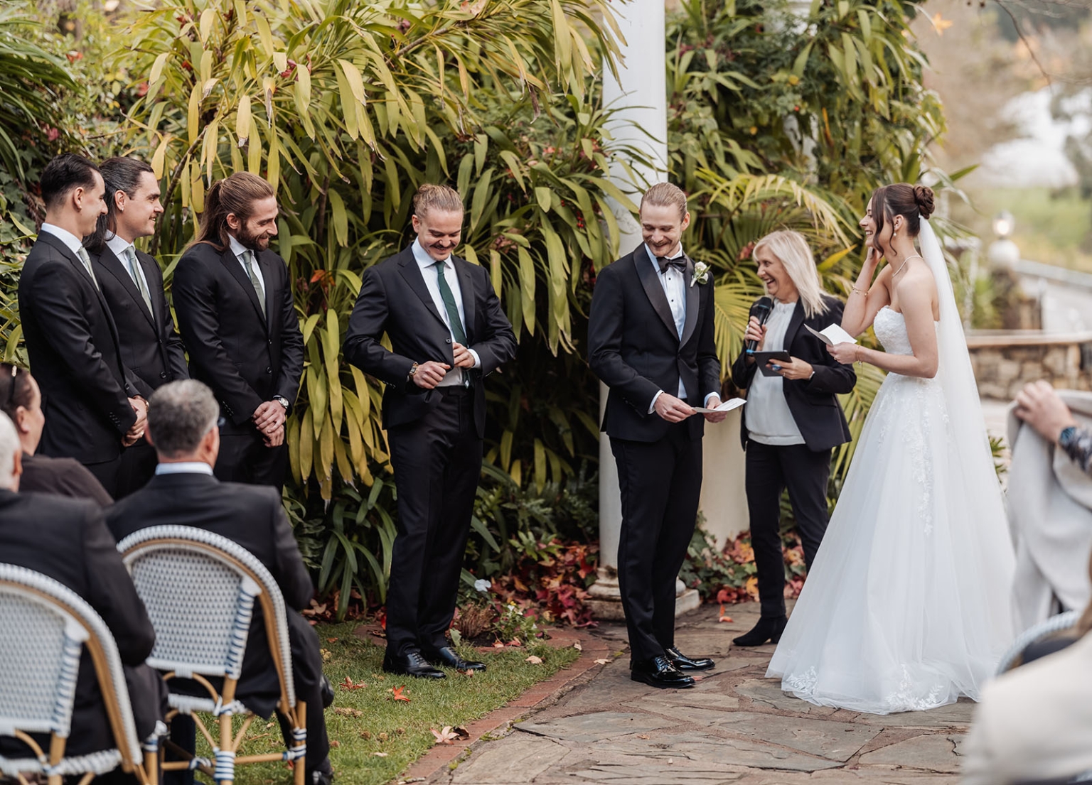 the manor wedding - crystal & mackenzie 55 Bride and groom share vows during intimate garden wedding ceremony.