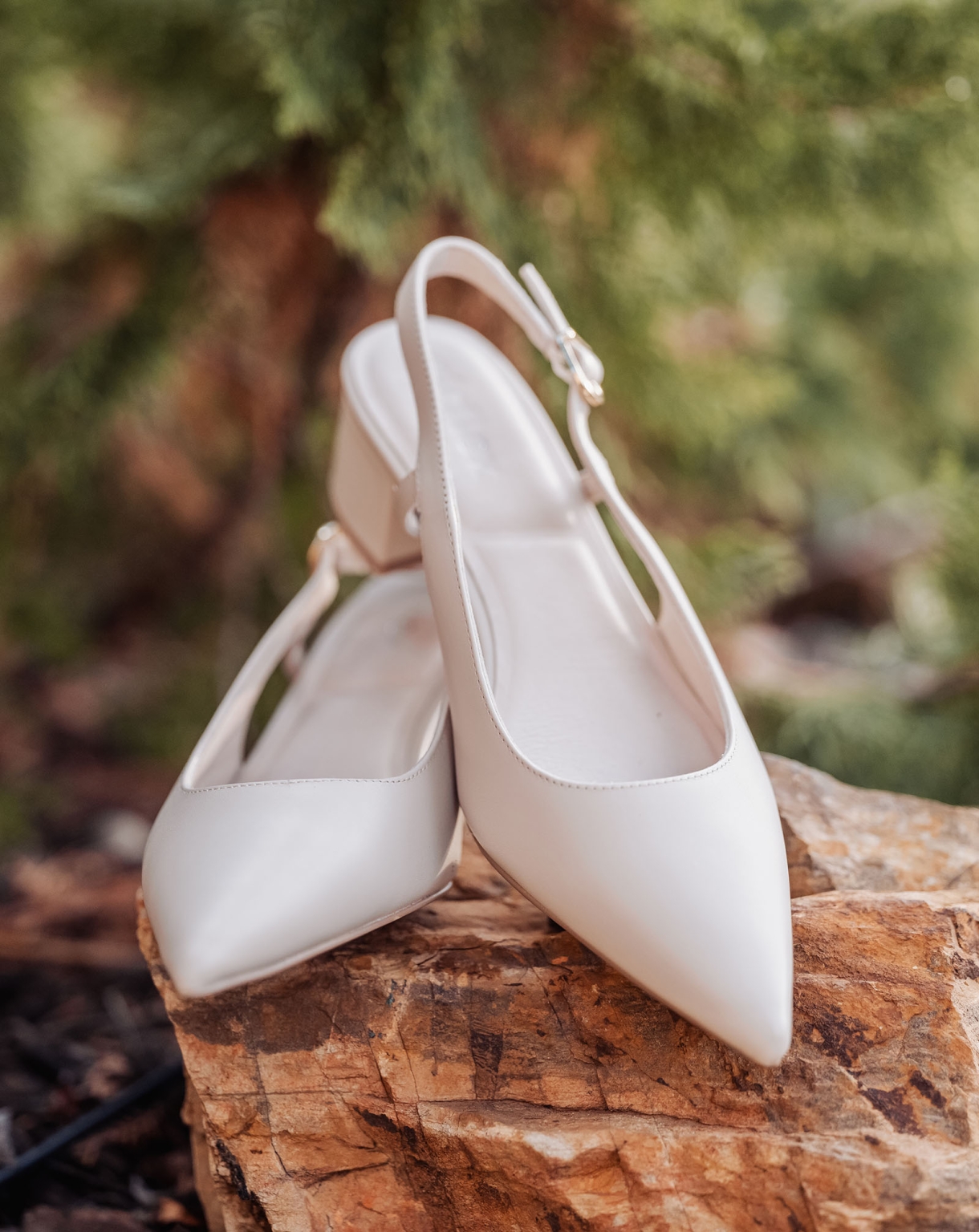 loxton's st peter's church wedding - madeline & brayden 15 Ivory slingback bridal heels on rustic tree stump outdoors.