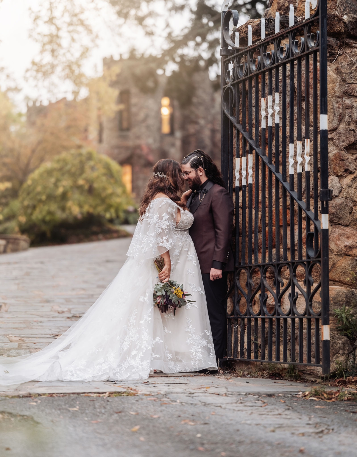 basket range wedding at the manor - leah & wes 58 Romantic bride and groom wedding portrait by wrought iron gate.