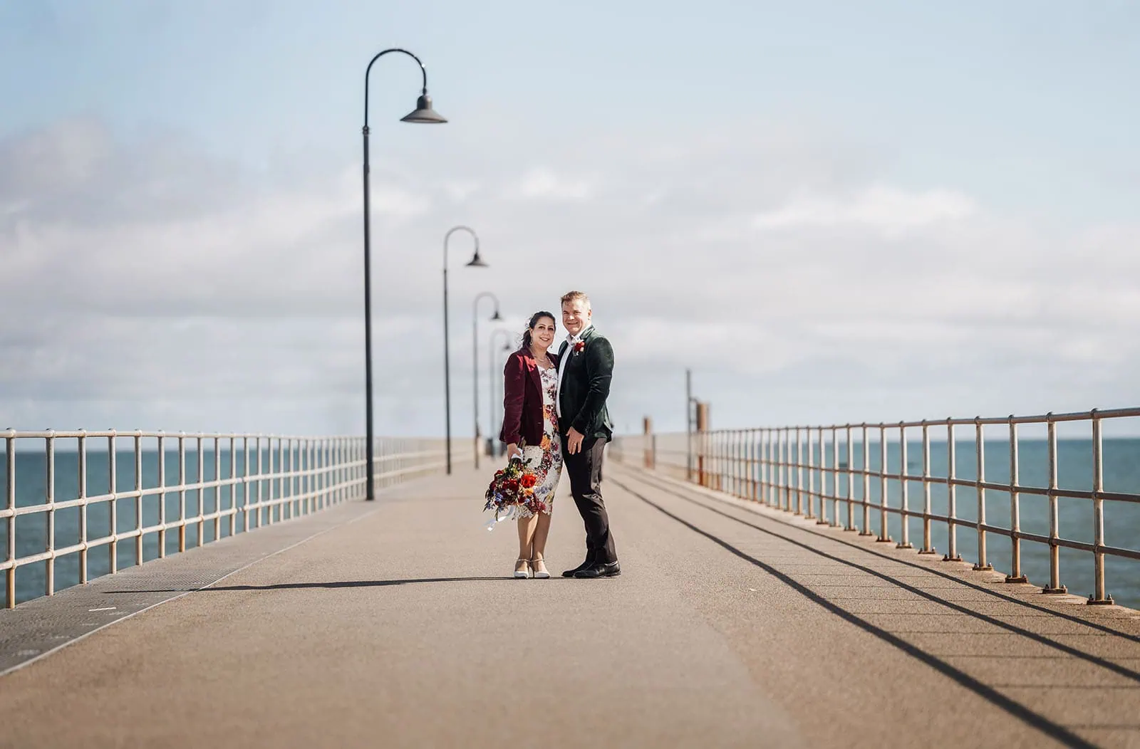 sa marriage office 10 Wedding couple portrait on seaside pier with ocean view.