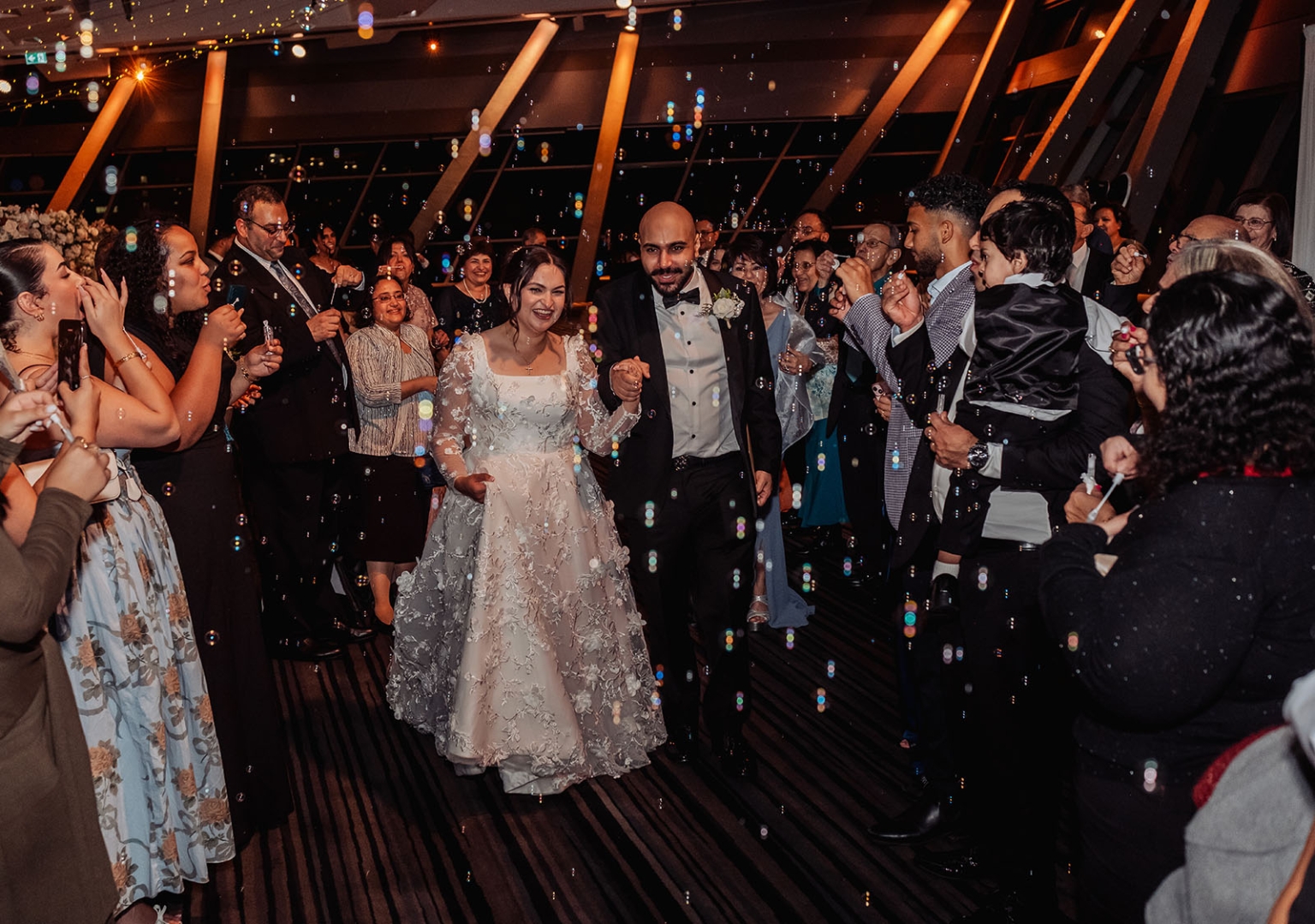 st george & st shenouda coptic church wedding - carmina & bill 95 Bride and groom wedding bubble exit with cheering guests.