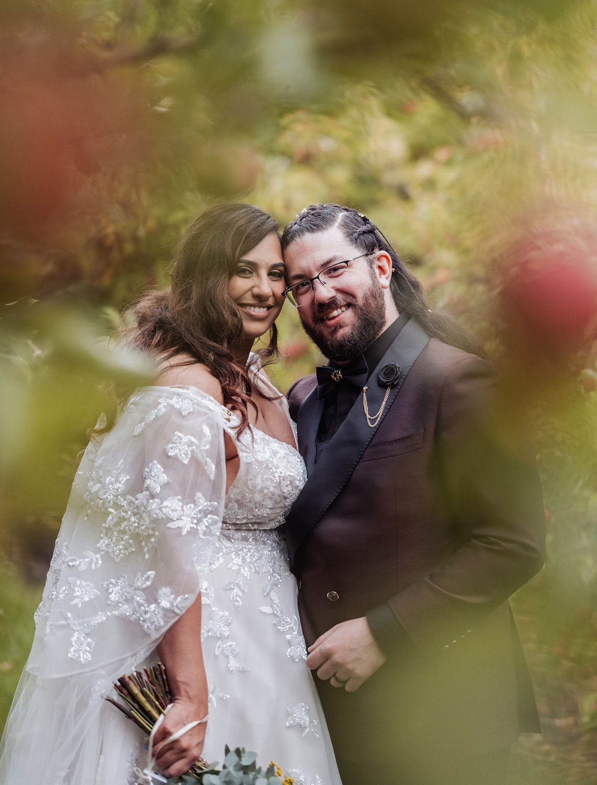 basket range wedding at the manor - leah & wes 57 Romantic outdoor wedding portrait of smiling bride and groom in a lush garden.