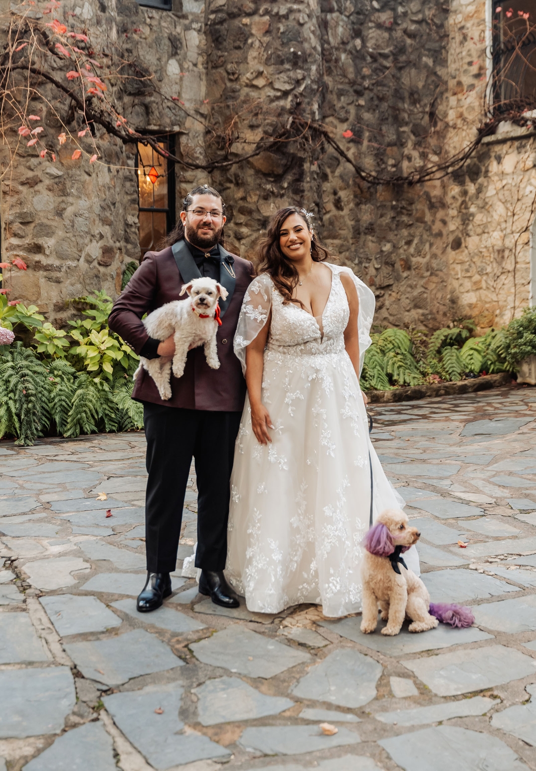 basket range wedding at the manor - leah & wes 38 Wedding couple with dogs in rustic stone courtyard.