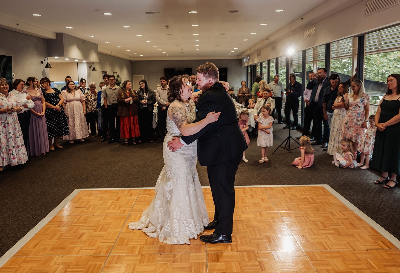 loxton's st peter's church wedding - madeline & brayden 62 Bride and groom share first dance at elegant wedding reception.