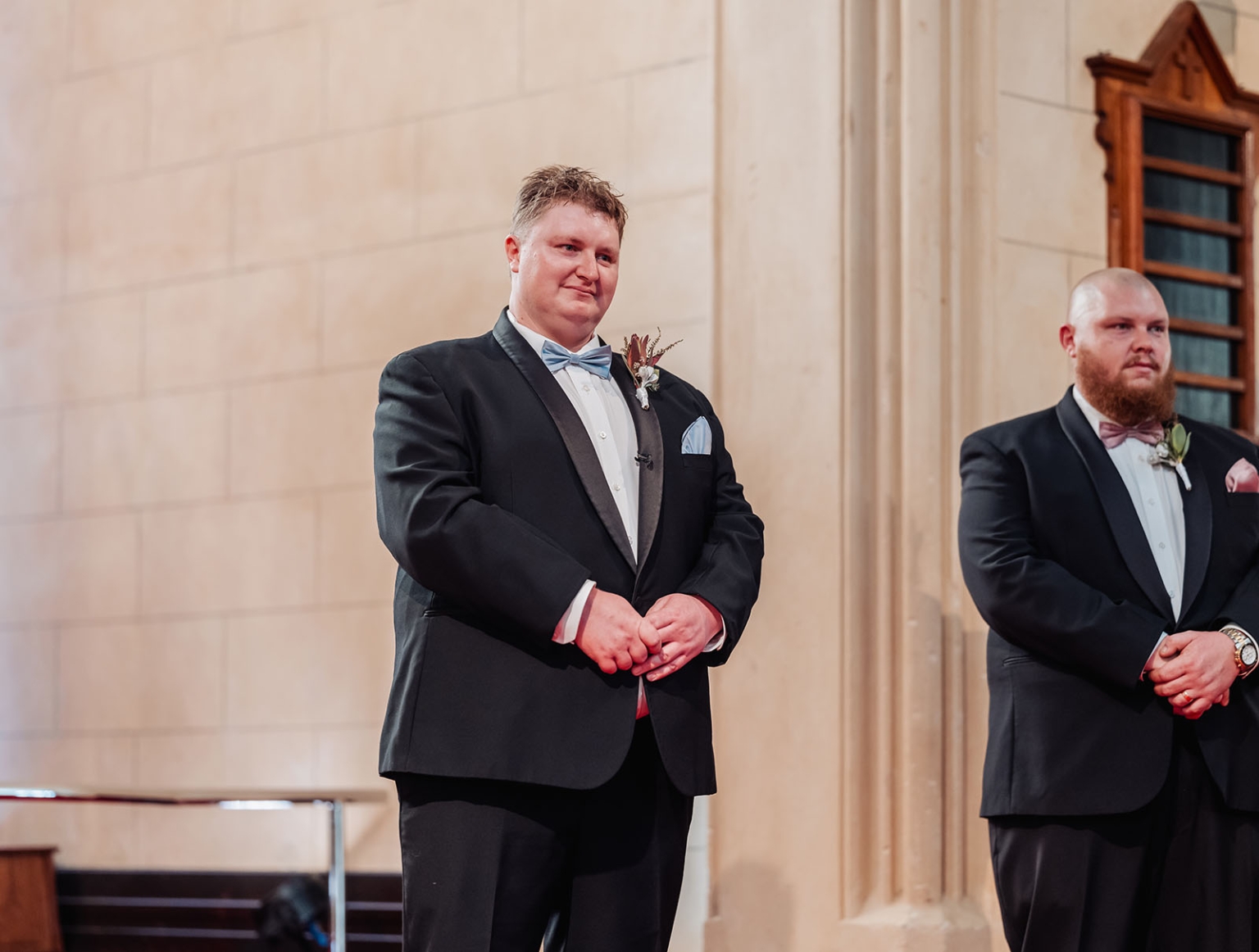 loxton's st peter's church wedding - madeline & brayden 30 Groom and groomsman in tuxedos at elegant wedding altar.
