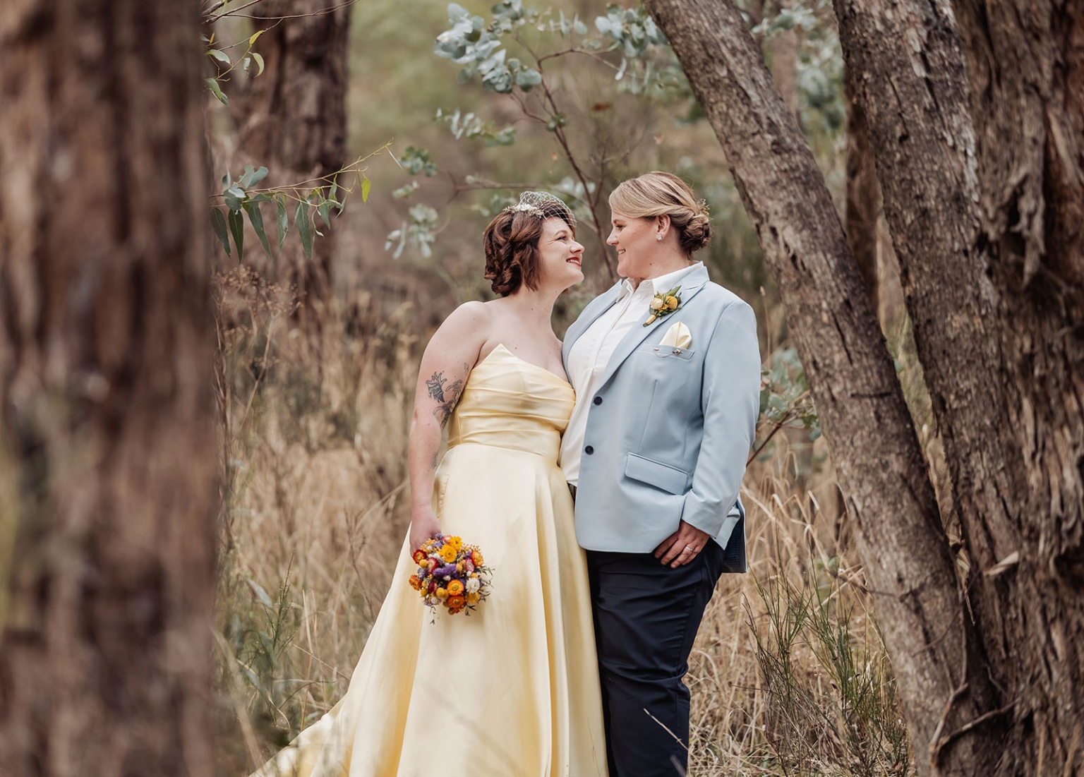 tiny house on the prairie wedding - lauren & bek 39 Woodland wedding portrait of romantic couple with bouquet in forest.