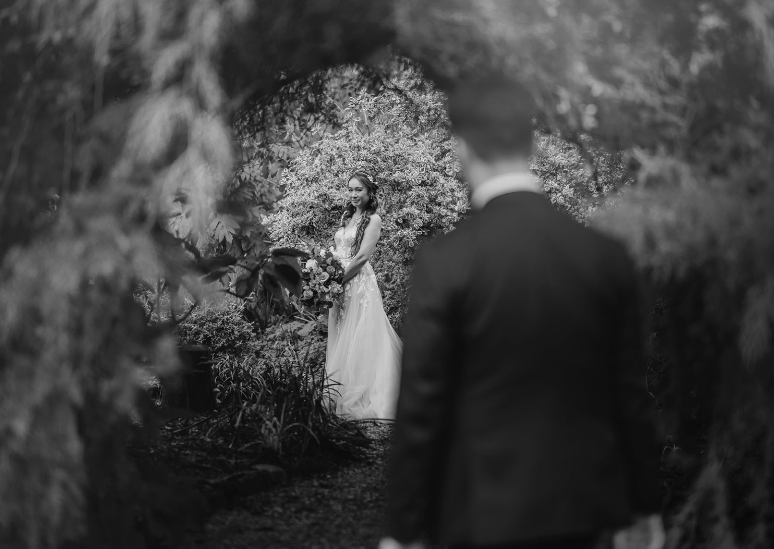 wedding at al-ru farm – teresa & thomas 32 Black and white wedding first look in lush garden with bride and groom.