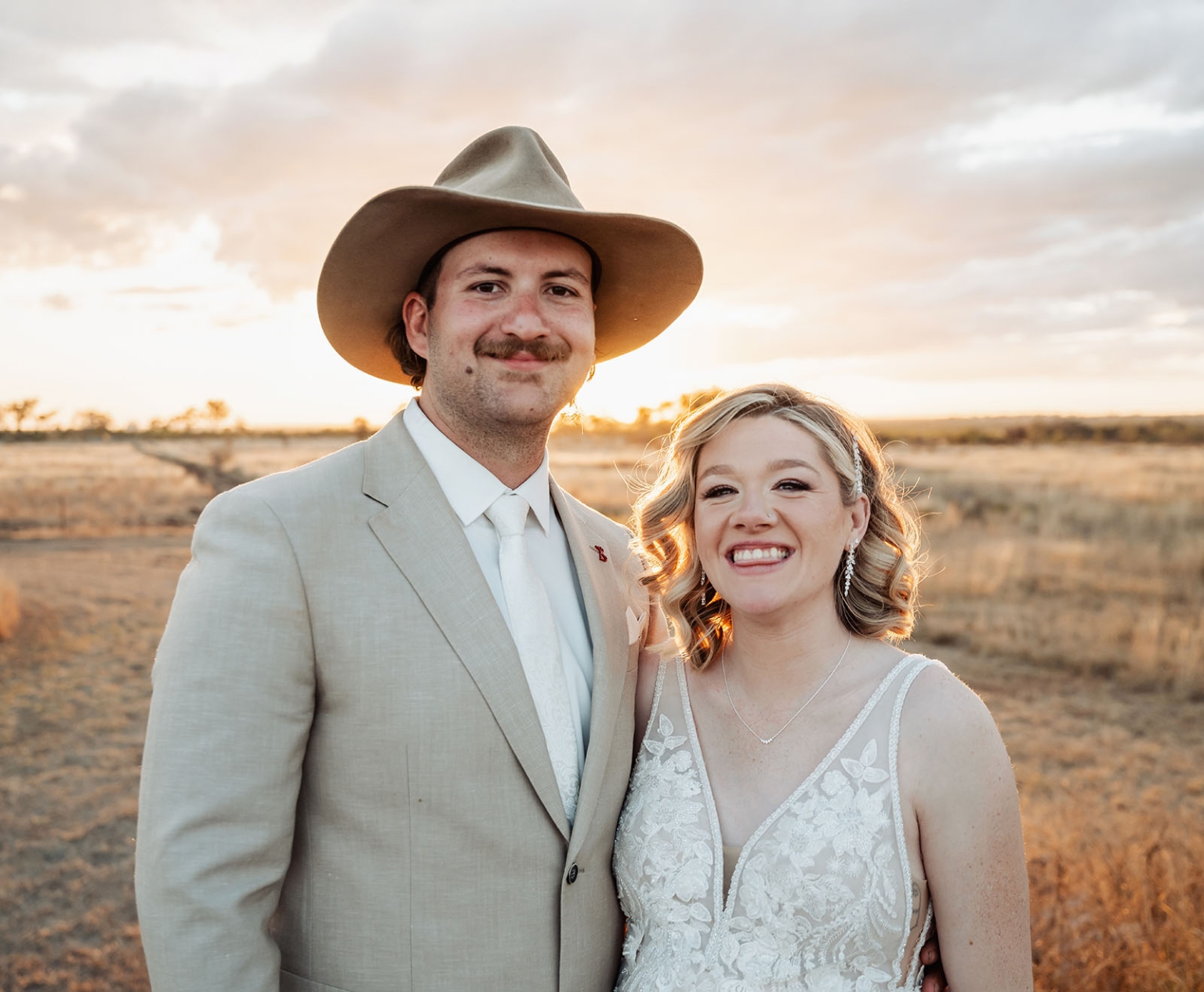 capella wedding photography – caitlin & adam’s farm wedding 174 Caitlin and Adam smiling together in wedding attire at sunset on their Capella farm wedding day