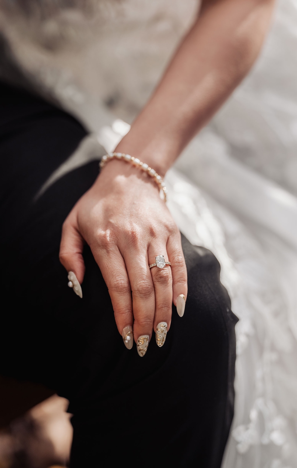 wedding at al-ru farm – teresa & thomas 8 Diamond engagement ring with bridal nail art and pearl bracelet.