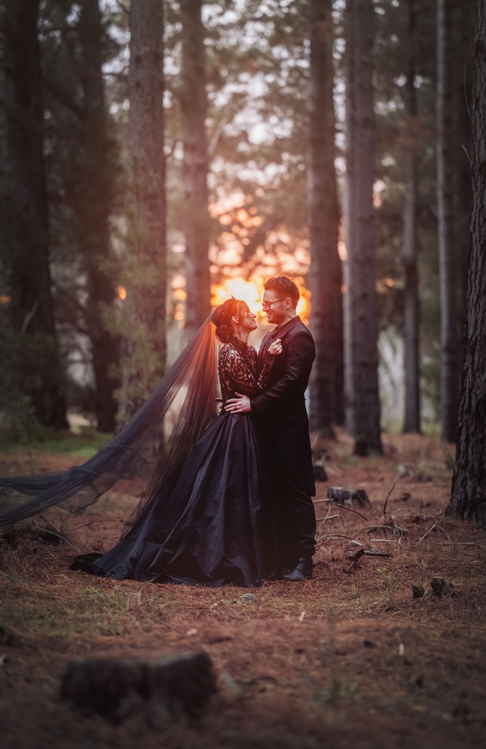 kuitpo hall wedding - courtney & jarrod 249 Gothic couple portrait in sunset forest with black wedding gown and veil.