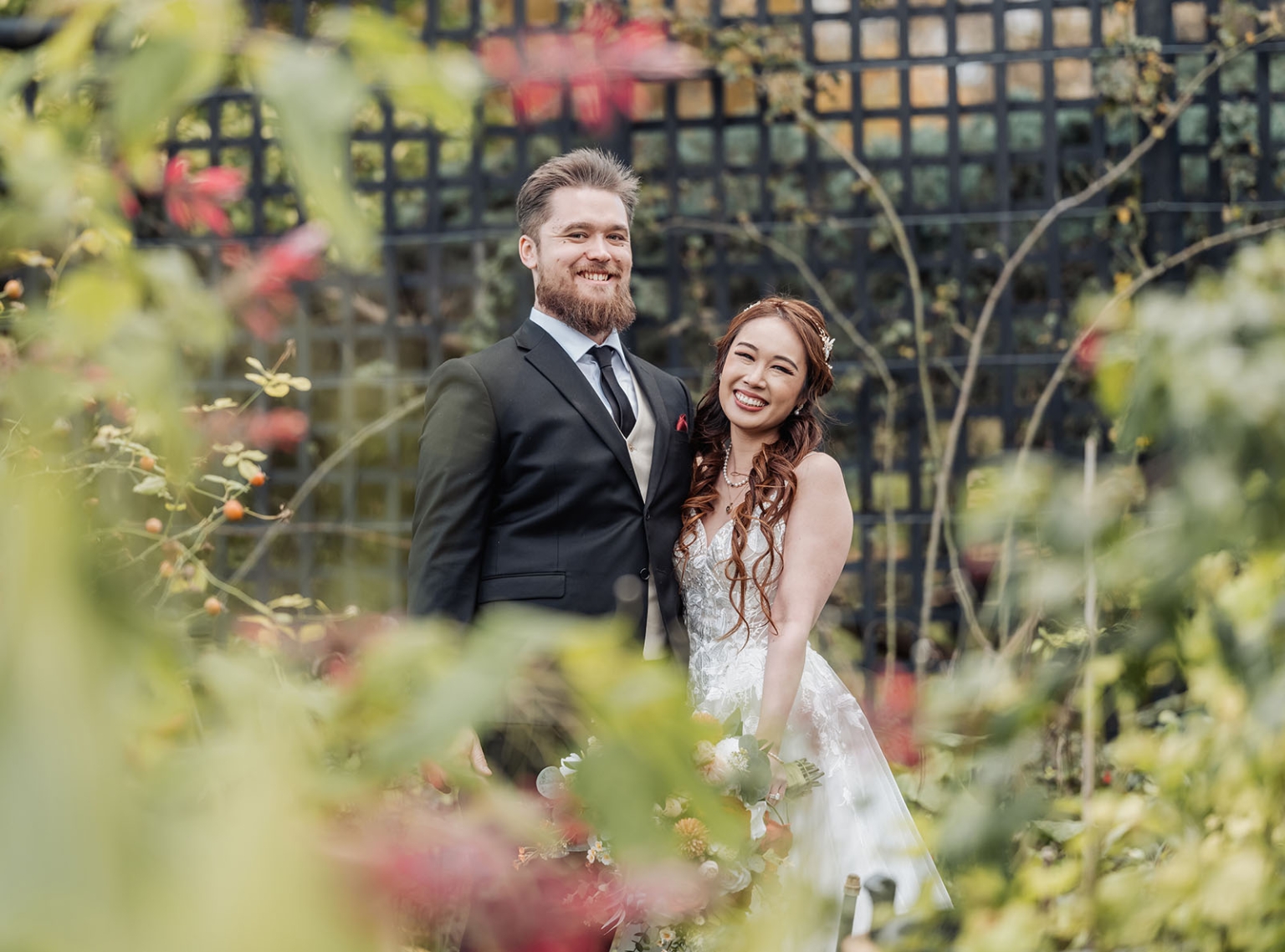 wedding at al-ru farm – teresa & thomas 30 Garden wedding portrait of smiling bride and groom among romantic flowers.