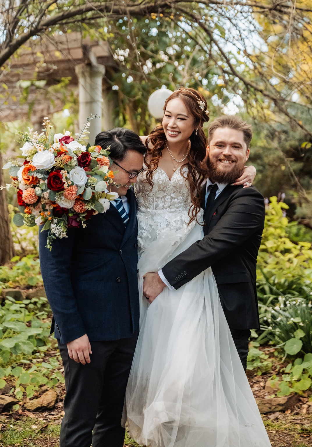 wedding at al-ru farm – teresa & thomas 31 Joyful garden wedding portrait of bride with groomsmen and vibrant autumn bouquet.