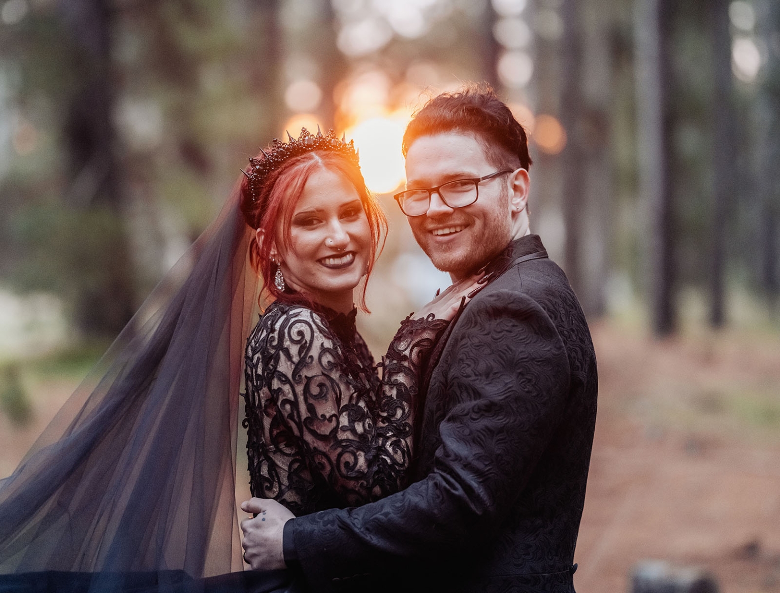 kuitpo hall wedding - courtney & jarrod 246 Gothic forest wedding portrait of couple in black attire at sunset.