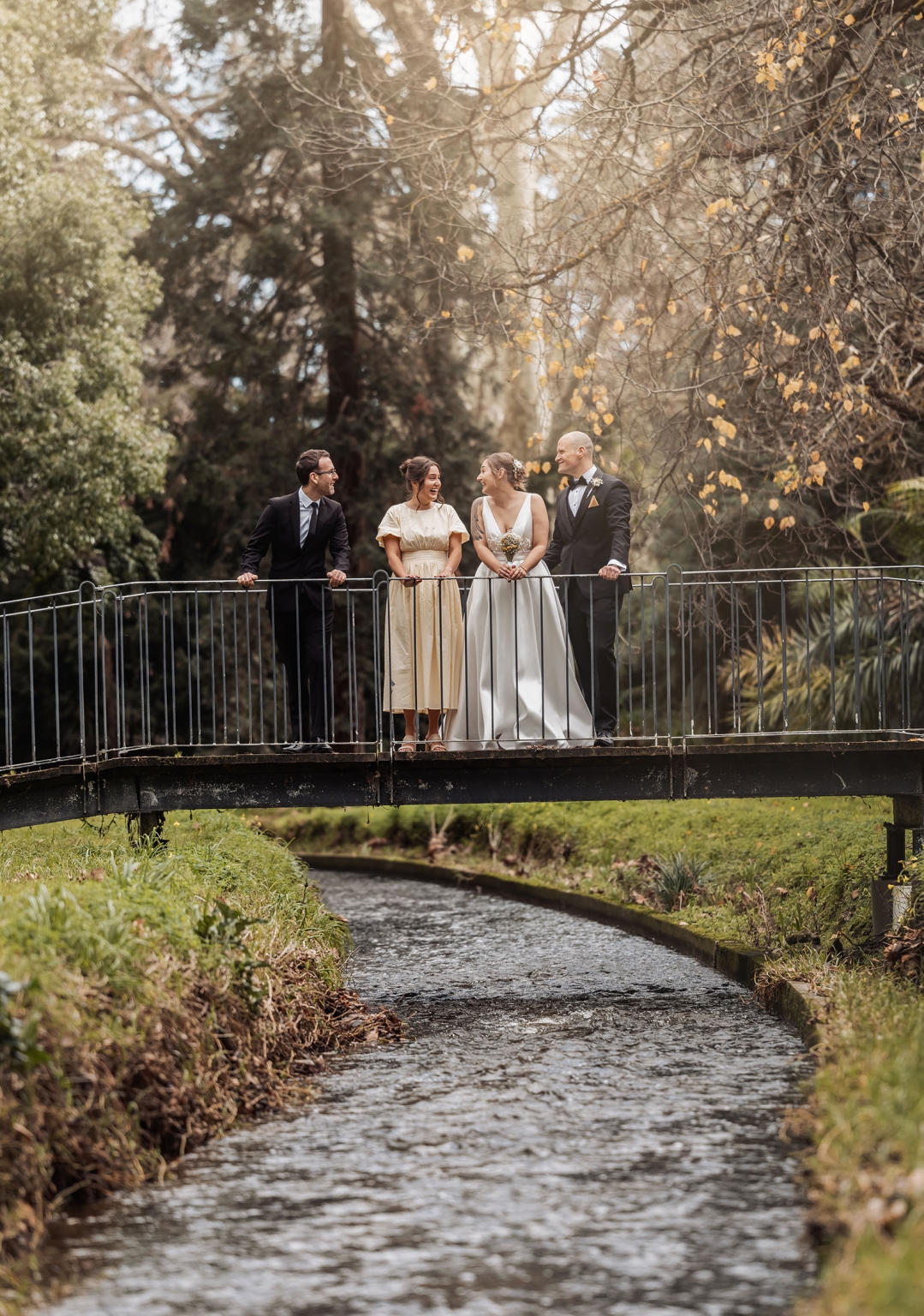 marriage registration office wedding - mia & roberto 65 Mia and Roberto standing with two guests on a footbridge above a stream in Adelaide Botanic Gardens