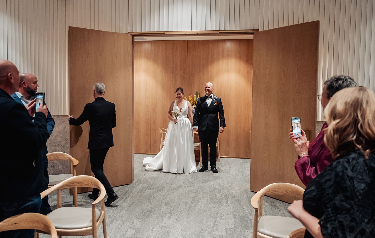 marriage registration office wedding - mia & roberto 85 Mia and Roberto entering their wedding ceremony at the Adelaide Marriage and Registration Office as guests take photos