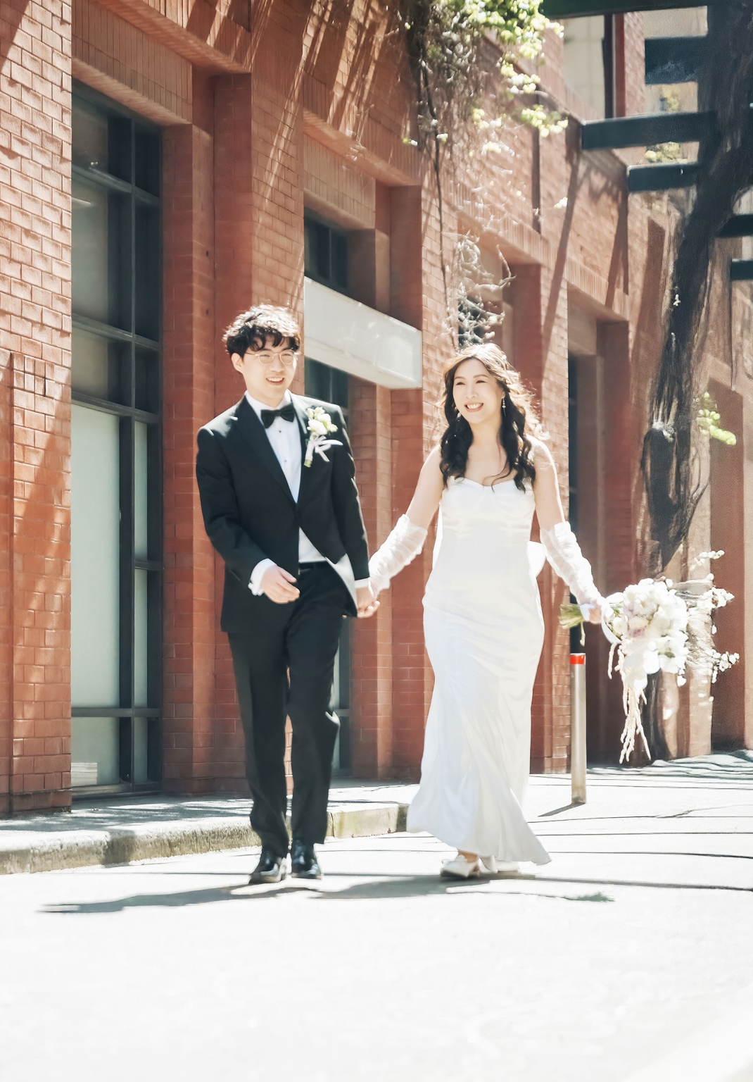 marriage rego office wedding – teri & thomas 14 Teri and Thomas walking hand in hand outside the Adelaide Marriage and Registration Office after their wedding ceremony