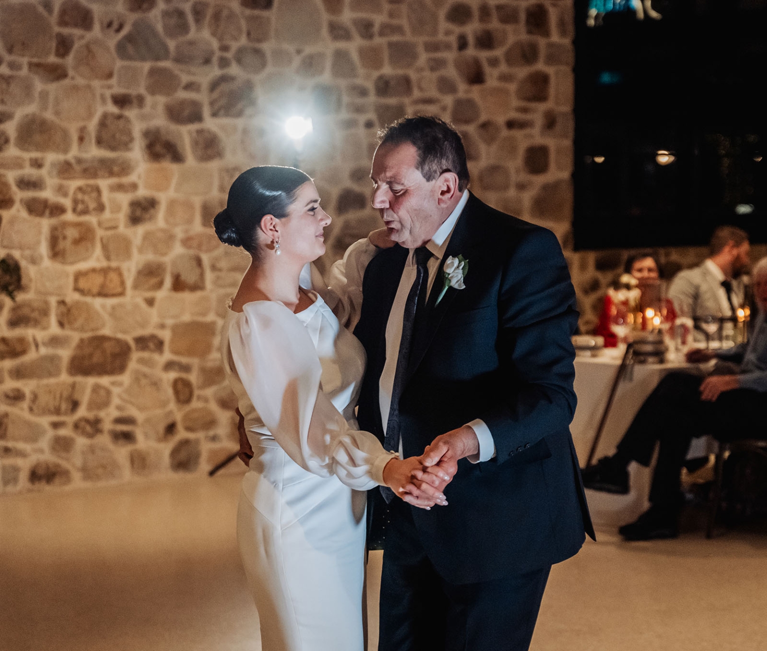 st joseph's chapel wedding – diana & michael 53 Bride in a white gown dancing with an older man in a dark suit at the wedding reception